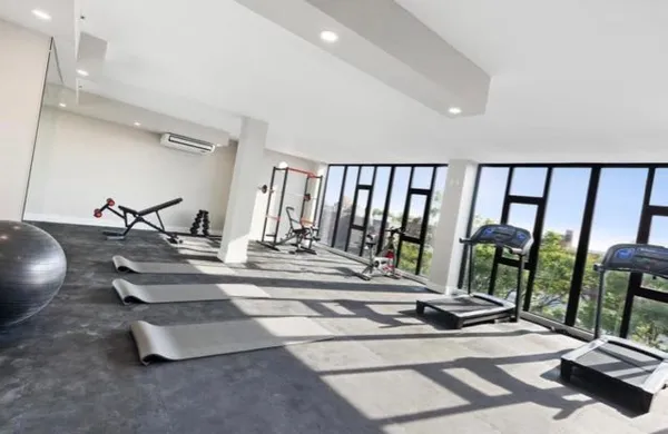 a view of a room with gym equipment