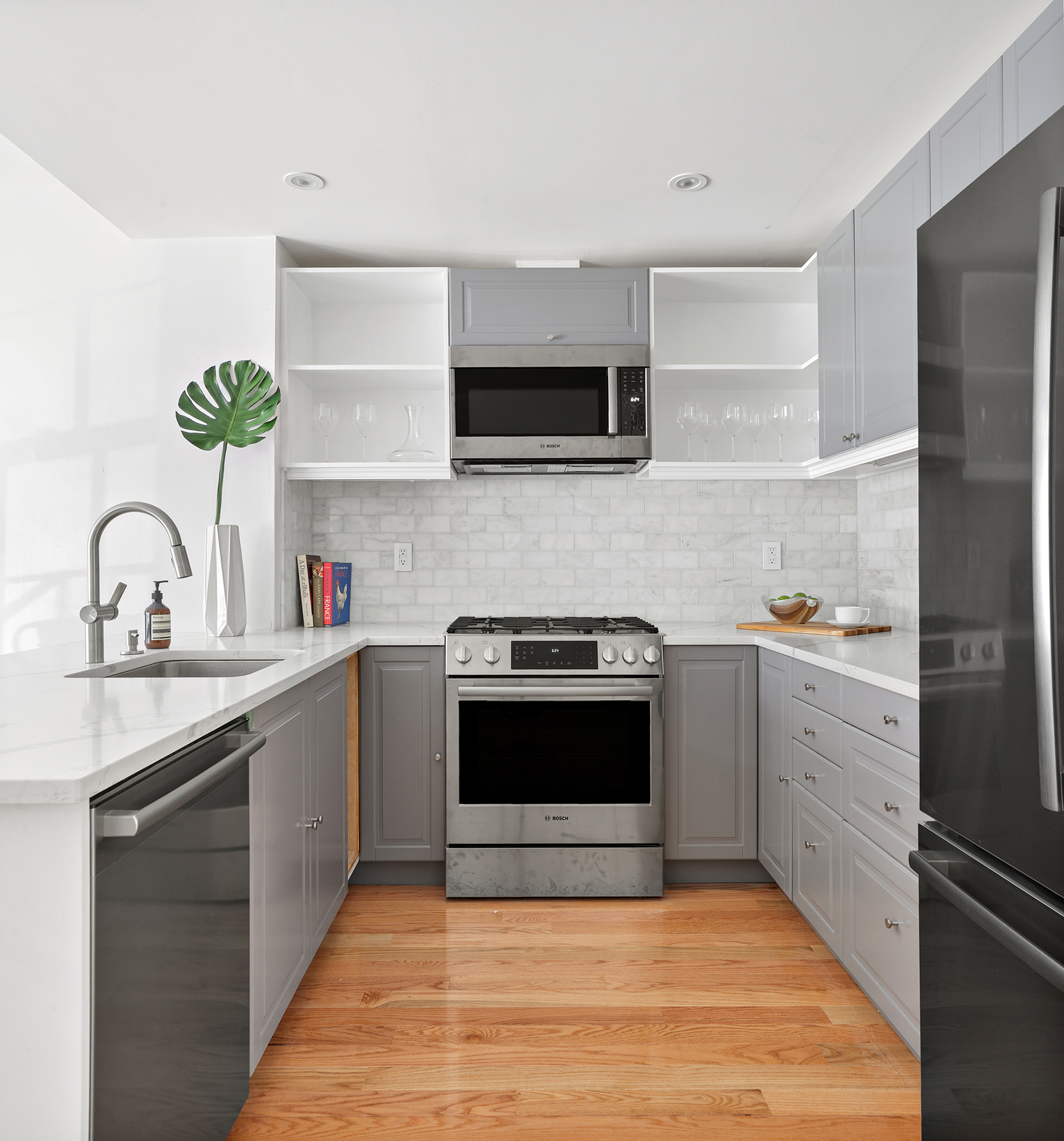 375 Van Brunt Street Brooklyn, NY 11231 - Photo 5 of 12 a kitchen with stainless steel appliances granite countertop a sink and a stove