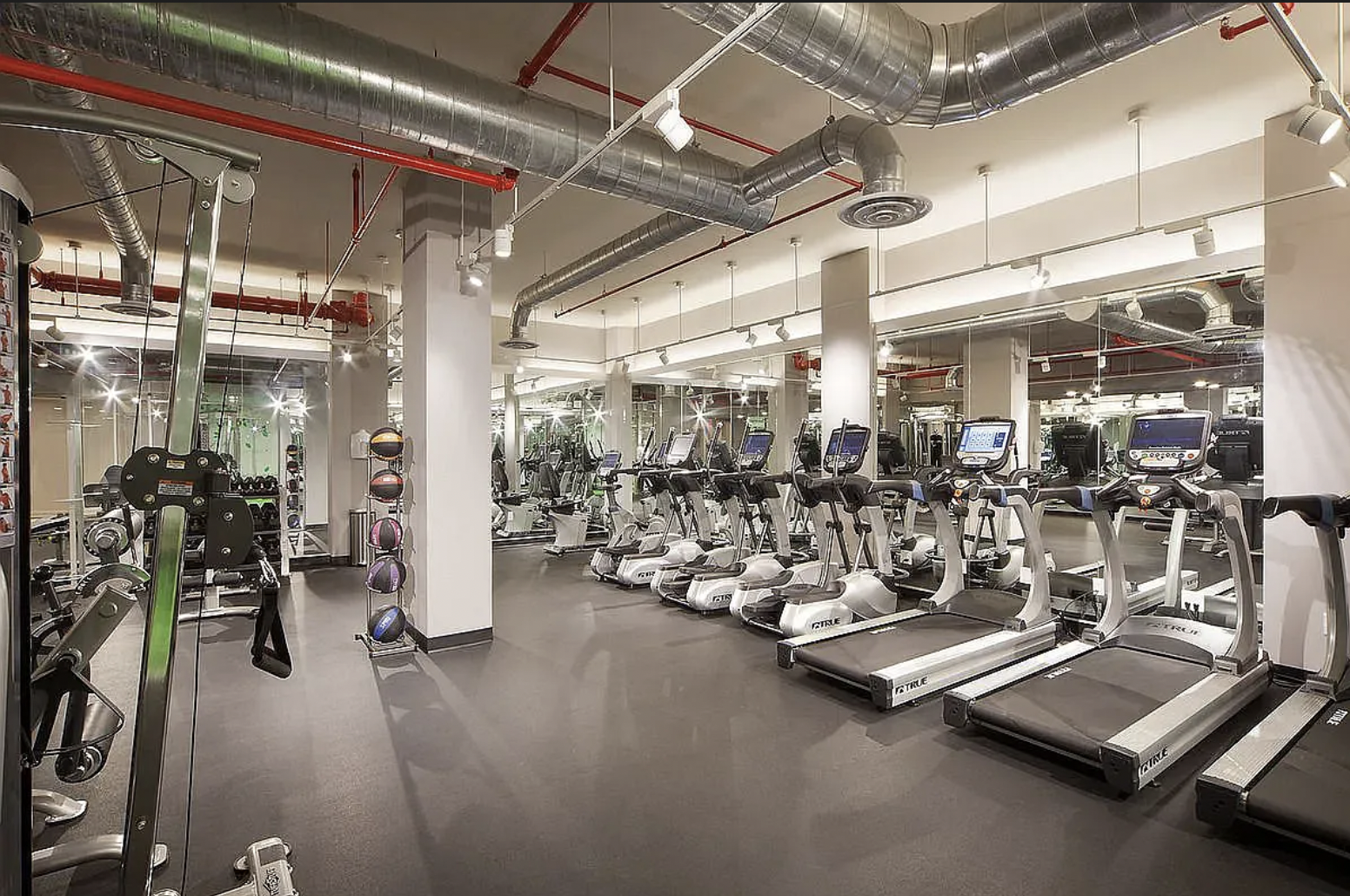 160 East 22nd Street, Unit 4D Manhattan, NY 10010 - Photo 7 of 15 a view of a room with gym equipment