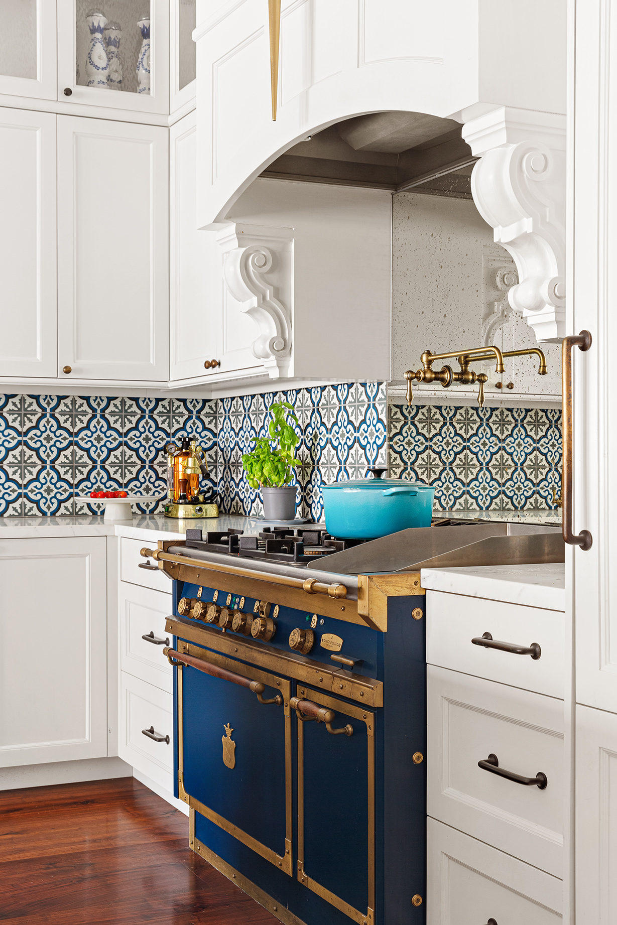 73 Wooster Street, Unit PHA Manhattan, NY 10012 - Photo 7 of 25 a kitchen with stainless steel appliances granite countertop a stove and a microwave