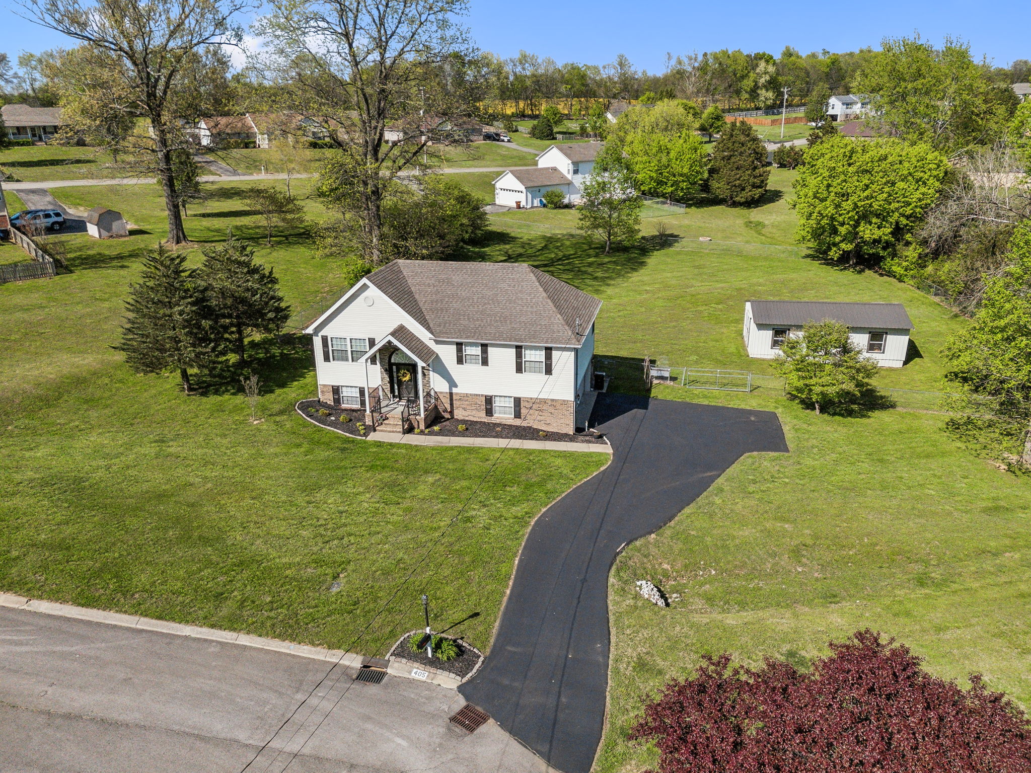 405 Billy Lane Spring Hill, TN 37174 - Photo 3 of 39 an aerial view of a house with garden space and ocean view