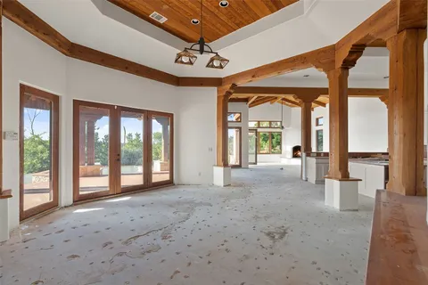 a view of a room with a large window