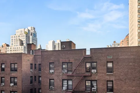 a front view of a building with balcony