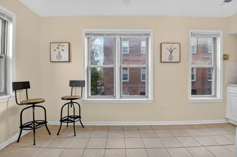 a view of a livingroom with furniture and windows