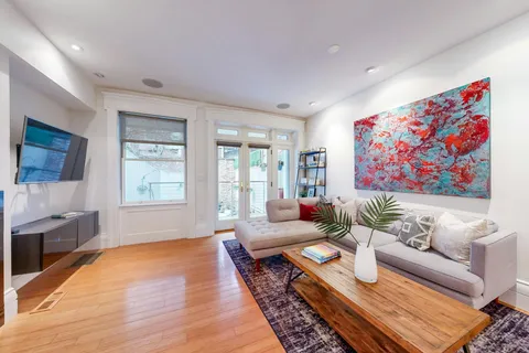 a living room with furniture and a couch