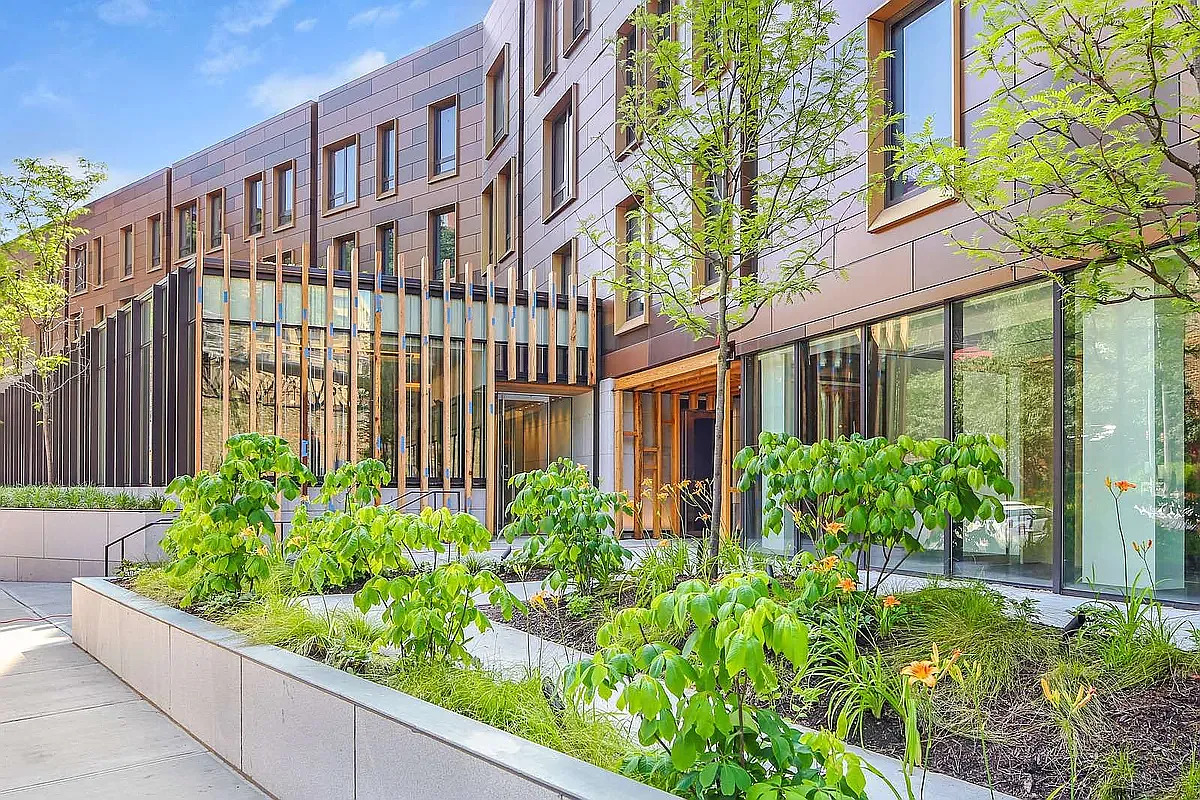 90 Furman Street, Unit N208 Brooklyn, NY 11201 - Photo 22 of 23 a view of a building with a garden