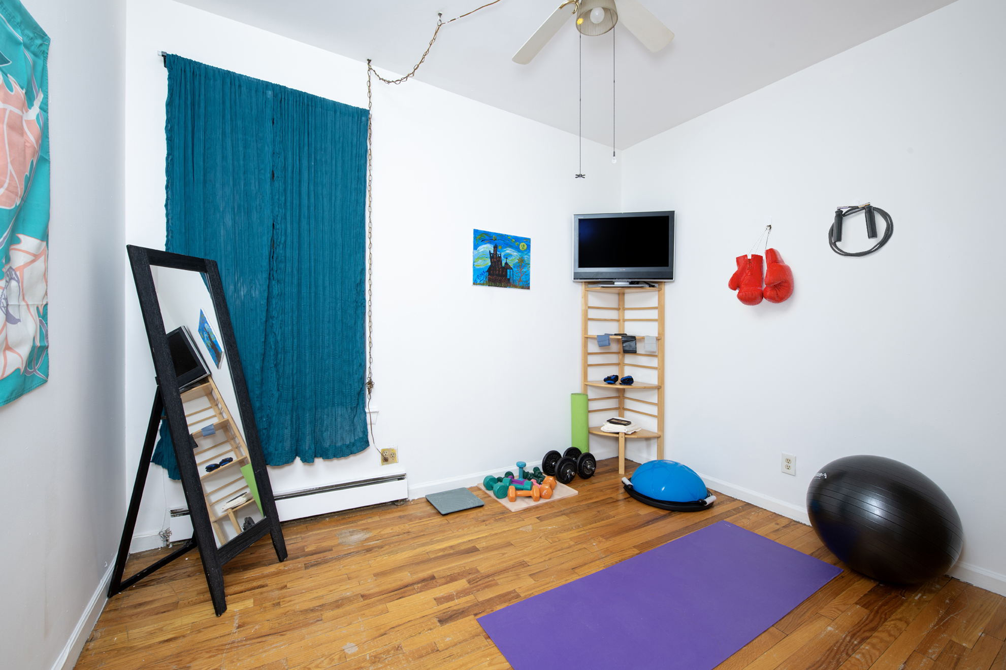 352 West 117th Street, Unit 1E Manhattan, NY 10026 - Photo 9 of 13 a bedroom with a bed and a chair