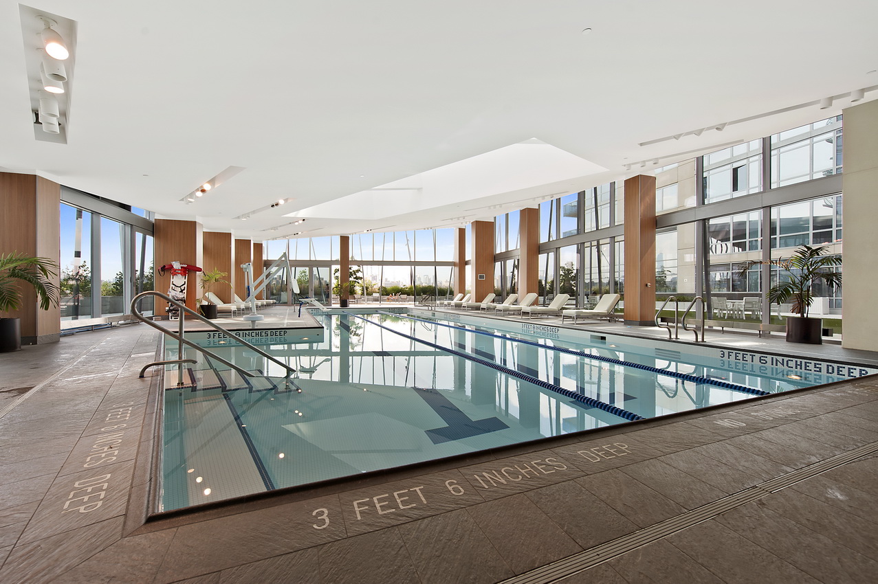 22 North 6th Street, Unit 25L Brooklyn, NY 11249 - Photo 12 of 26 a view of a swimming pool with furniture