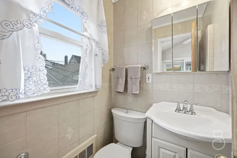 a bathroom with a sink and a toilet