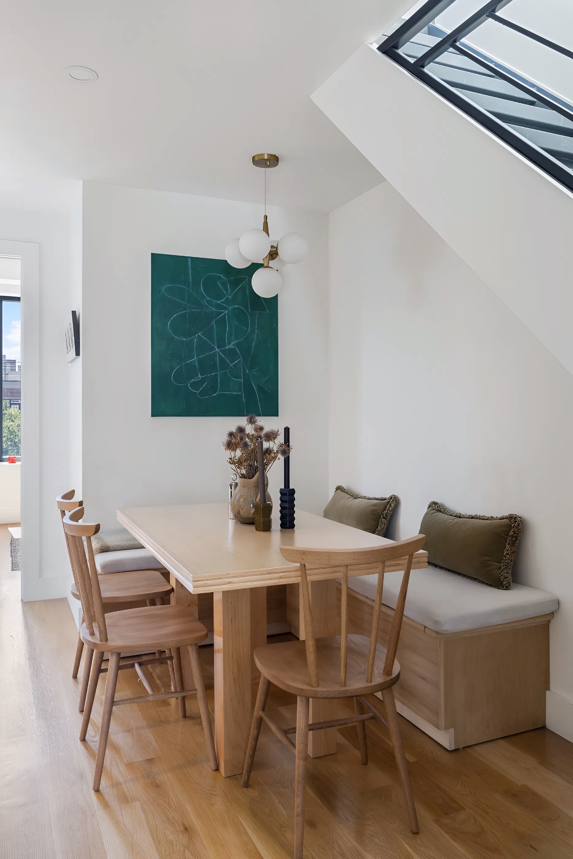 340 Metropolitan Avenue, Unit PHB Brooklyn, NY 11211 - Photo 6 of 18 a view of a dining room with furniture and wooden floor