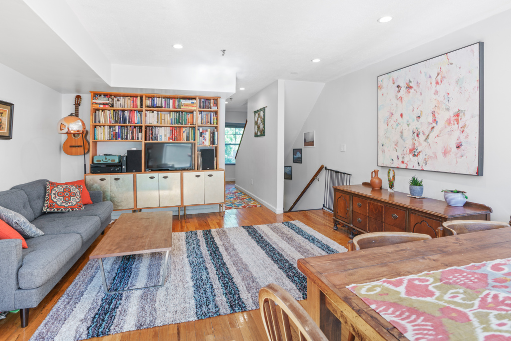 95 Vanderbilt Avenue, Unit AA Brooklyn, NY 11205 - Photo 2 of 11 a living room with furniture and wooden floor