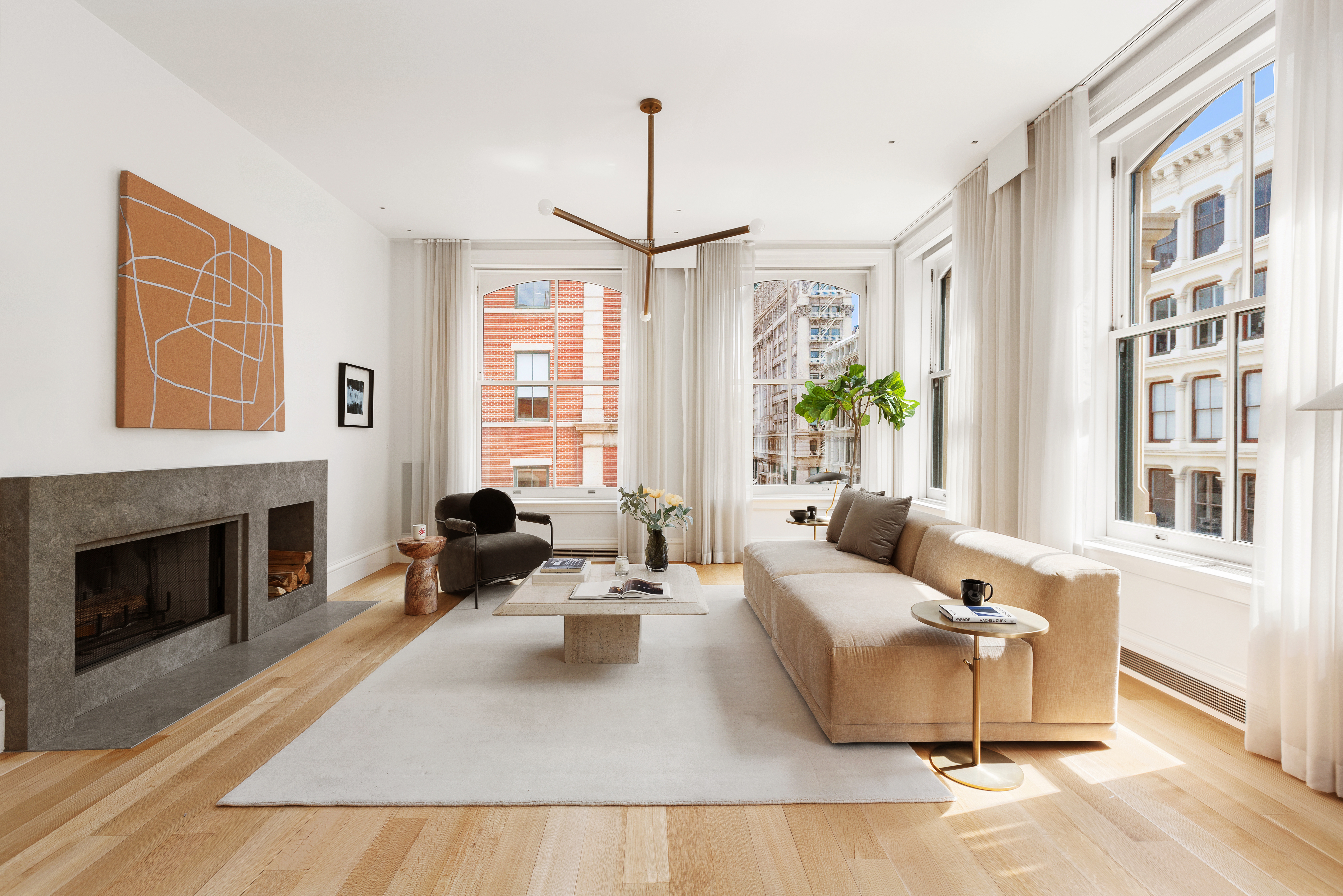 470 Broome Street, Unit 4S Manhattan, NY 10013 - Photo 3 of 14 a living room with furniture fireplace and window