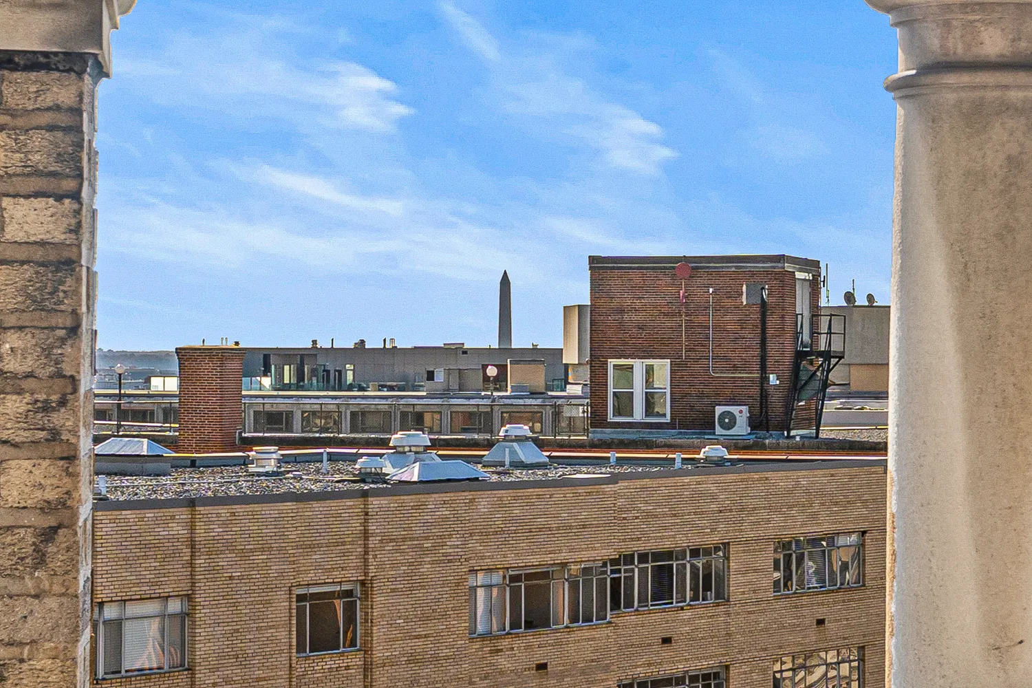 a view of a building with a city view