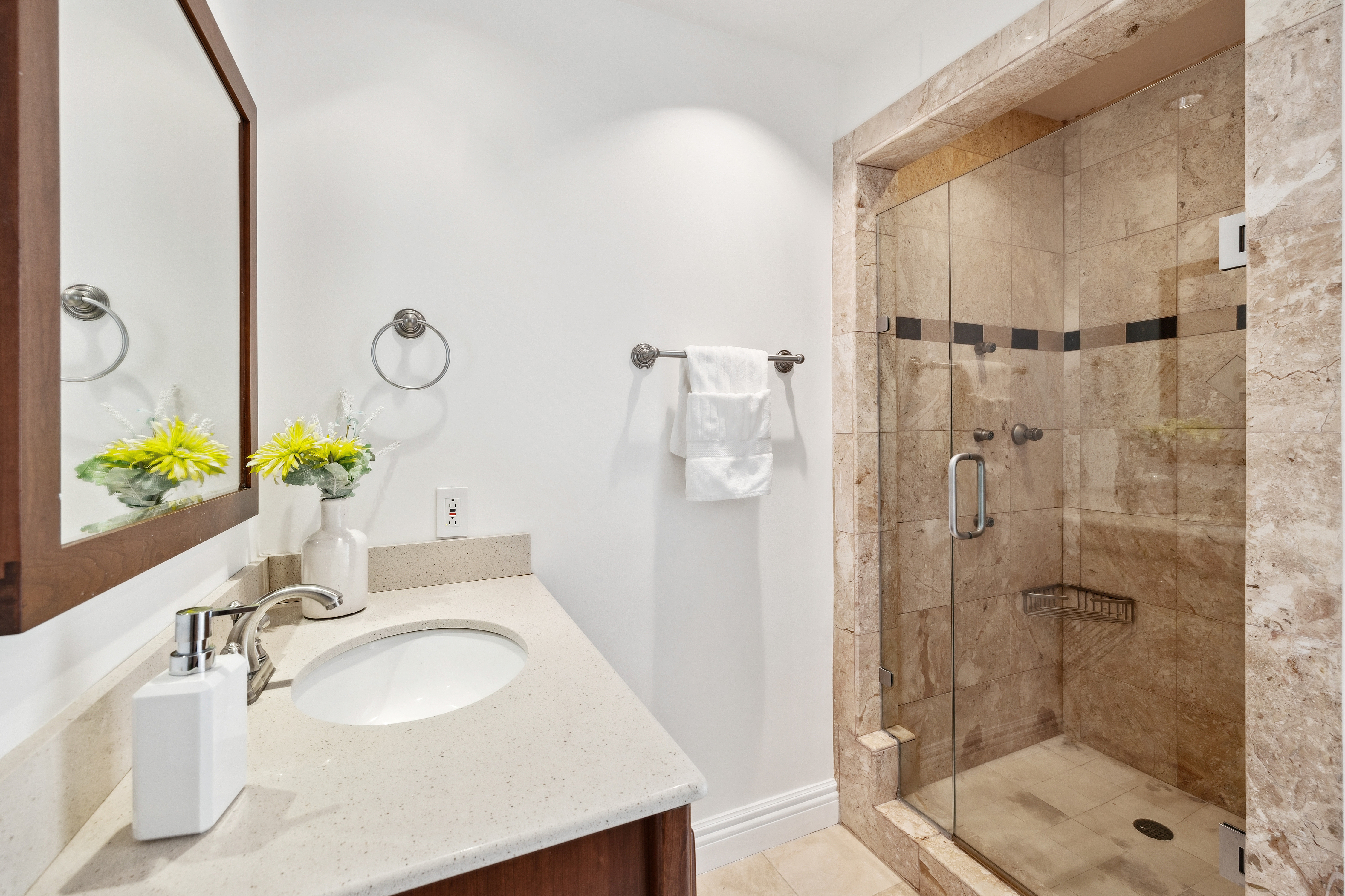 1998 Pacific Avenue San Francisco, CA 94109 - Photo 13 of 28 a bathroom with a granite countertop sink a toilet and shower