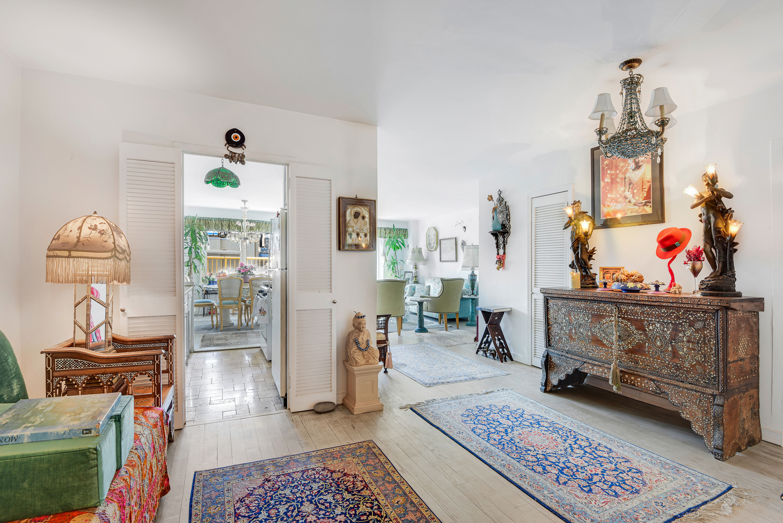 305 East 24th Street, Unit 18C Manhattan, NY 10010 - Photo 7 of 13 a living room with furniture