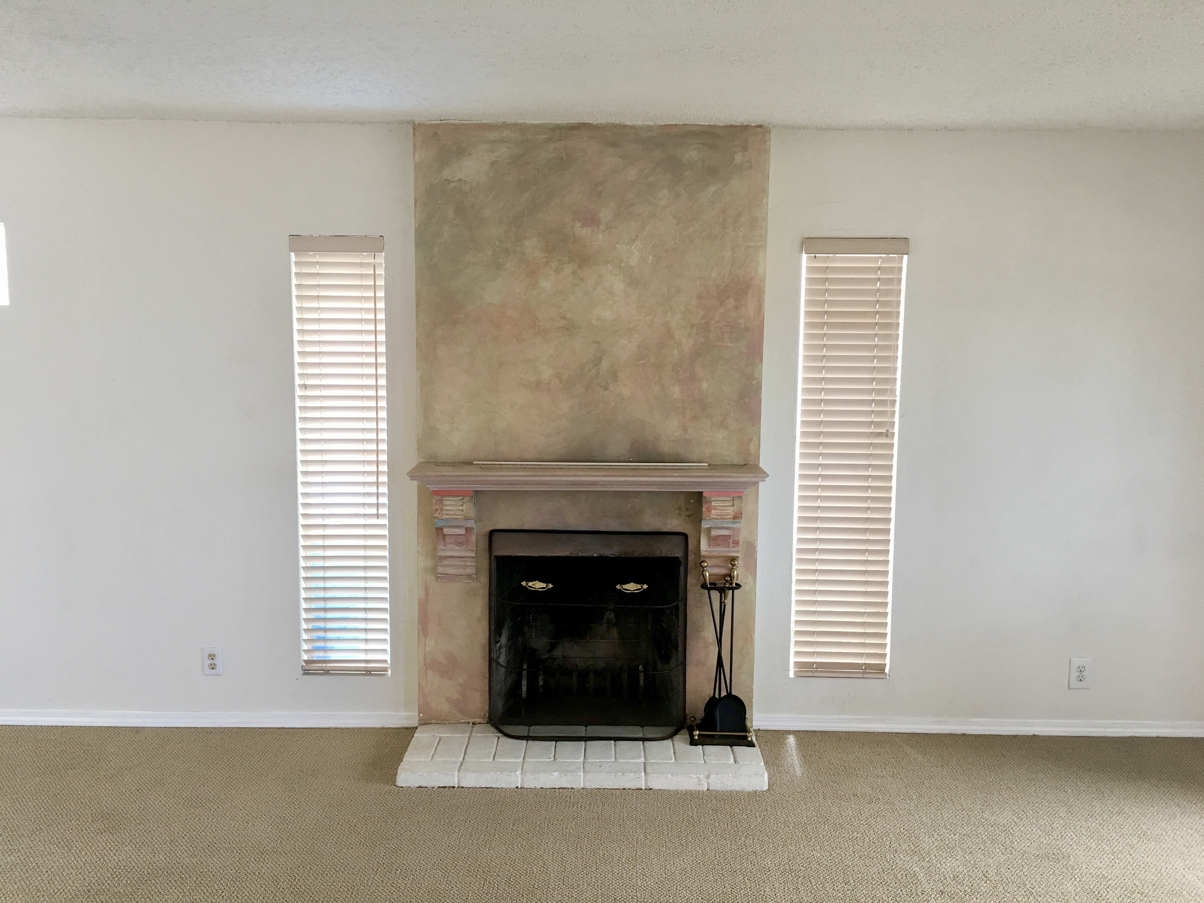 371 Inverness Drive Pacifica, CA 94044 - Photo 4 of 15 a living room with a fireplace and a window