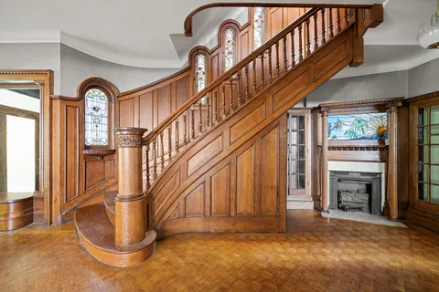 a view of an entryway with staircase