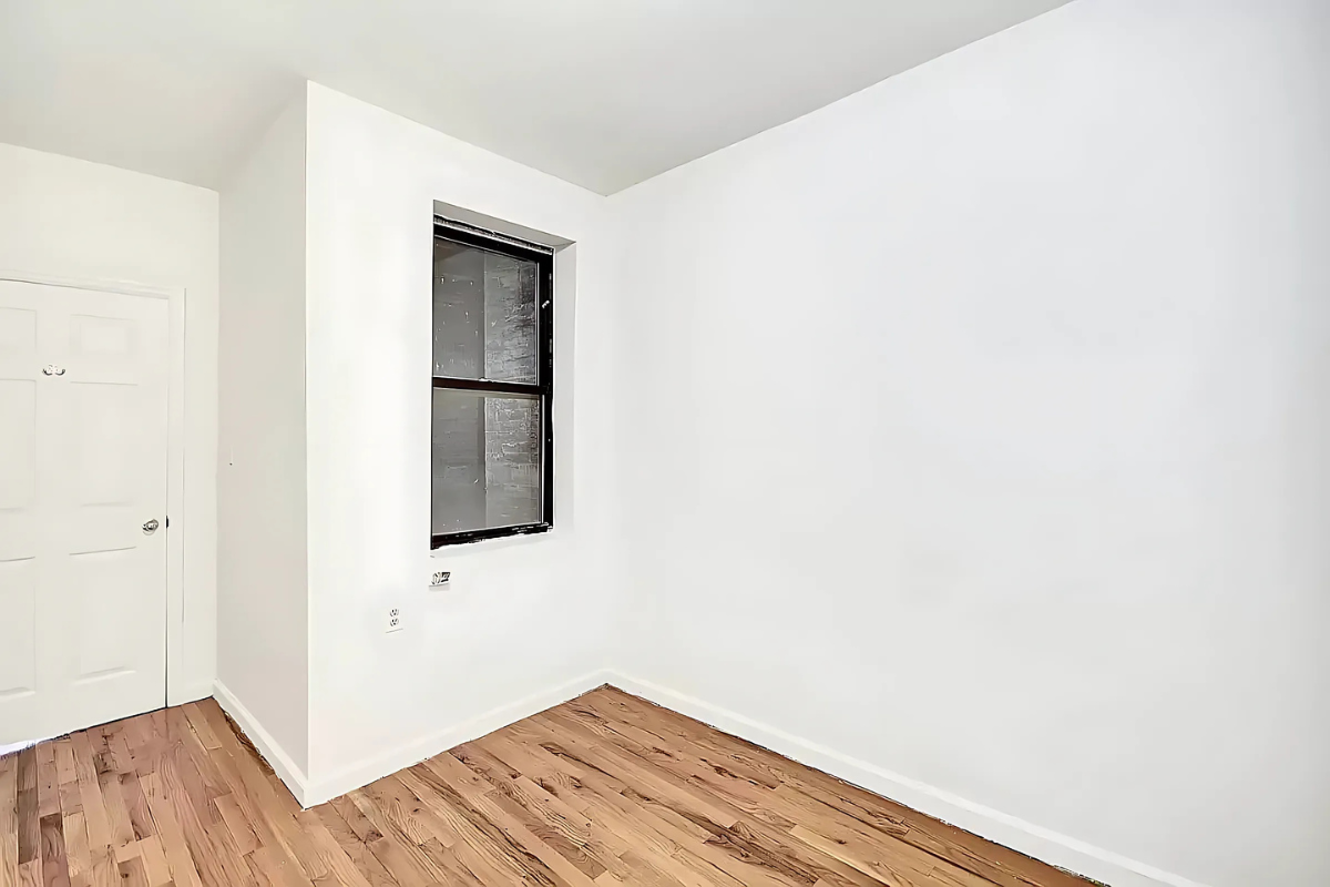 422 Amsterdam Avenue, Unit 2C Manhattan, NY 10024 - Photo 4 of 8 a view of hallway with wooden floor