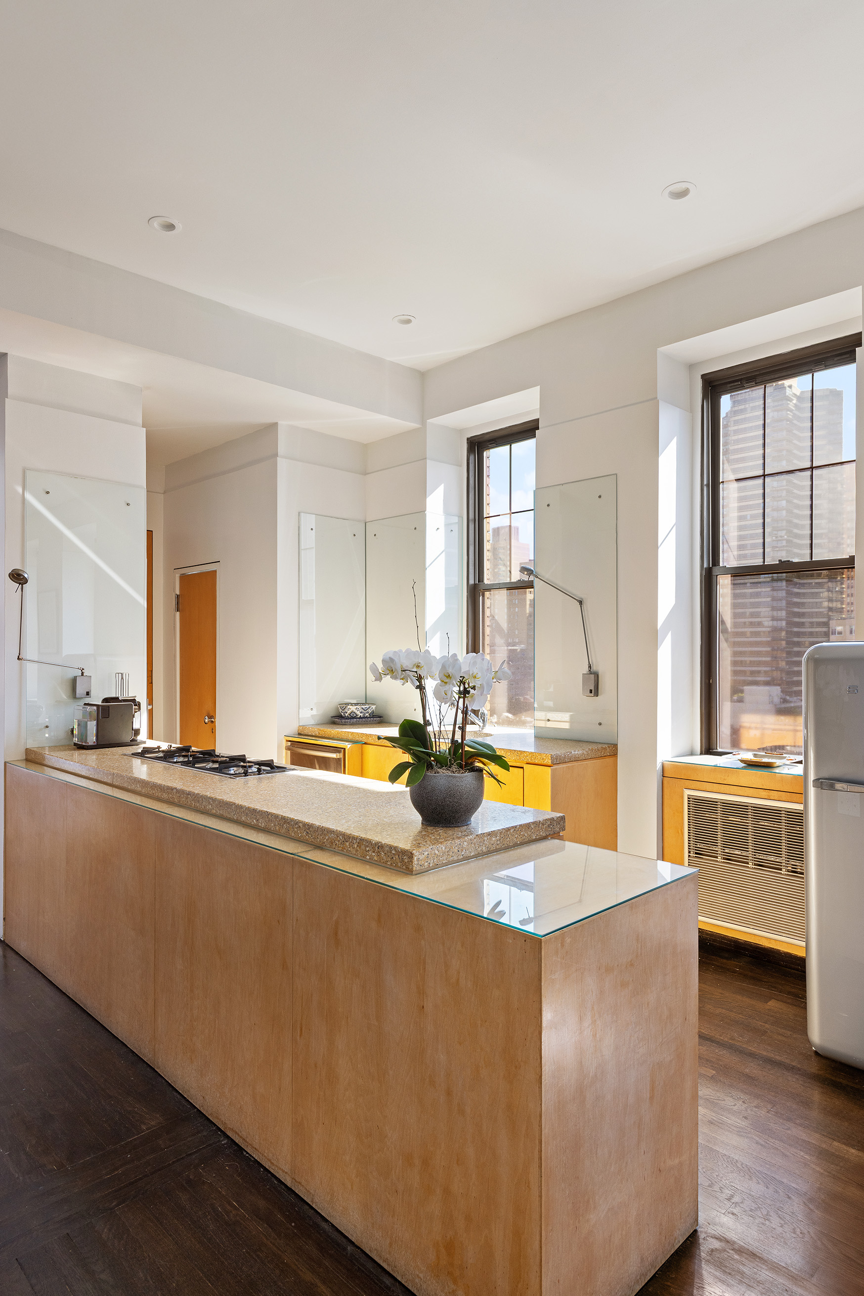 521 Park Avenue, Unit 10A Manhattan, NY 10065 - Photo 3 of 11 a living room with furniture and a large window