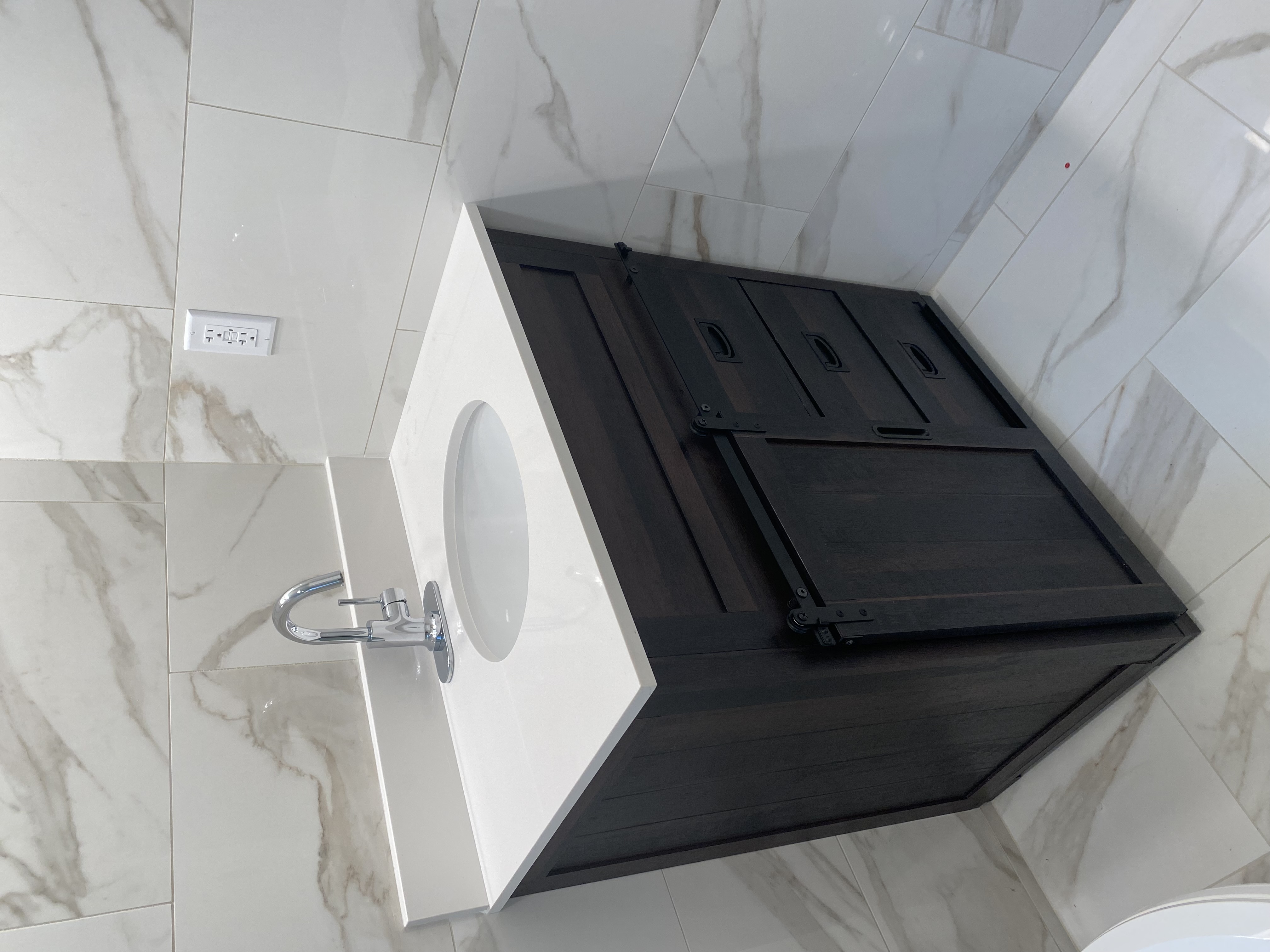5151 Nagle Avenue, Unit GUEST Sherman Oaks, CA 91423 - Photo 8 of 11 a bathroom with a sink vanity and a mirror