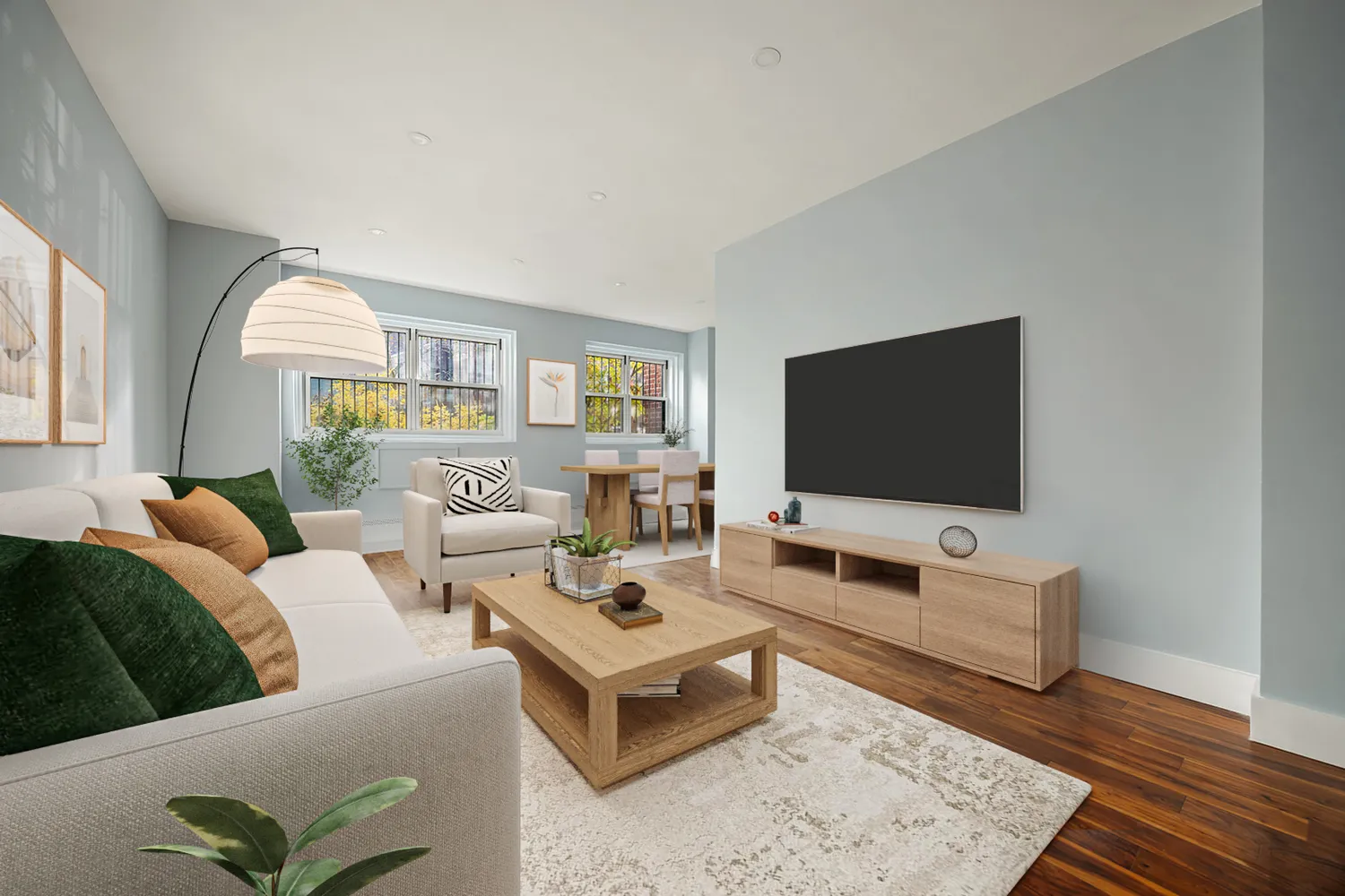 a living room with furniture and a flat screen tv