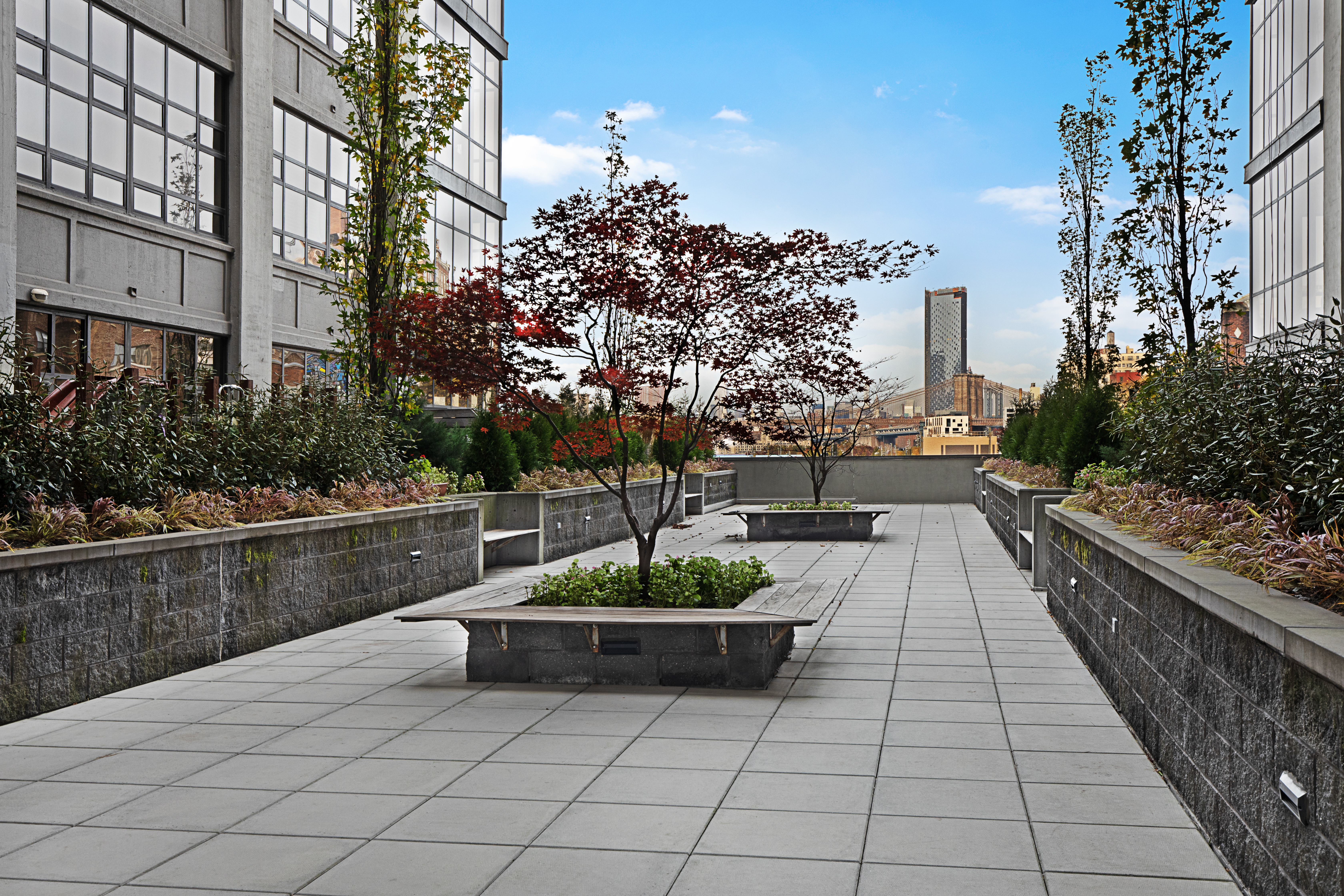 360 Furman Street, Unit 508 Brooklyn, NY 11201 - Photo 18 of 28 a view of a terrace with furniture and flowers
