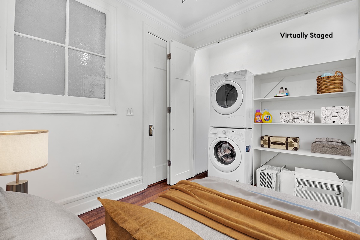 47 Fort Washington Avenue, Unit 55 Manhattan, NY 10032 - Photo 16 of 20 a bedroom with a bed and a chair