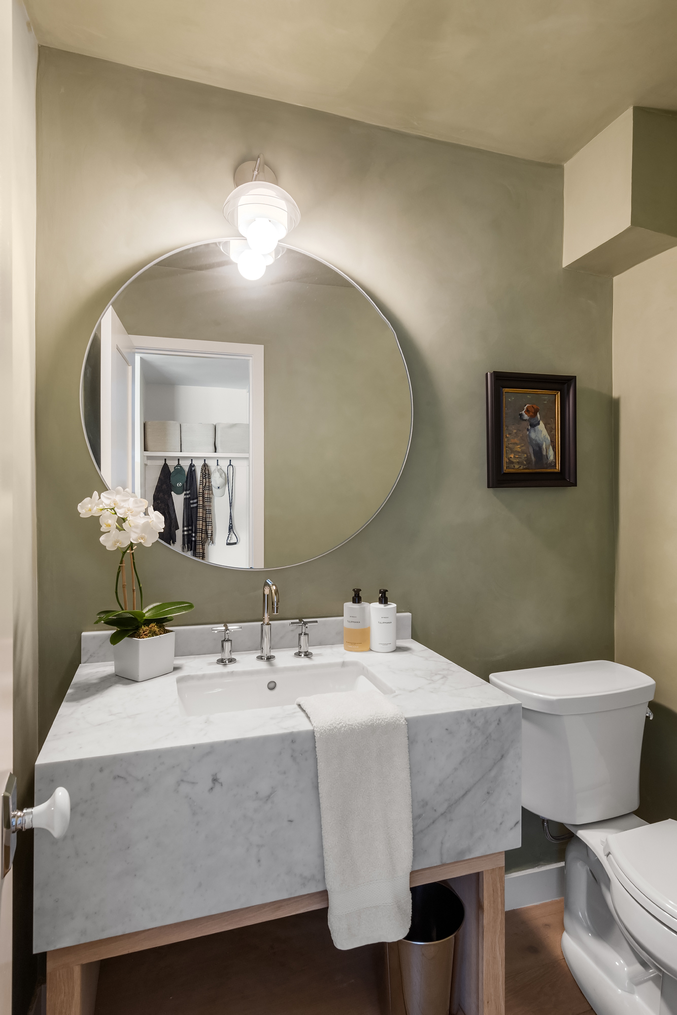 101 West 12th Street, Unit 12R Manhattan, NY 10011 - Photo 18 of 21 a bathroom with a sink and a mirror