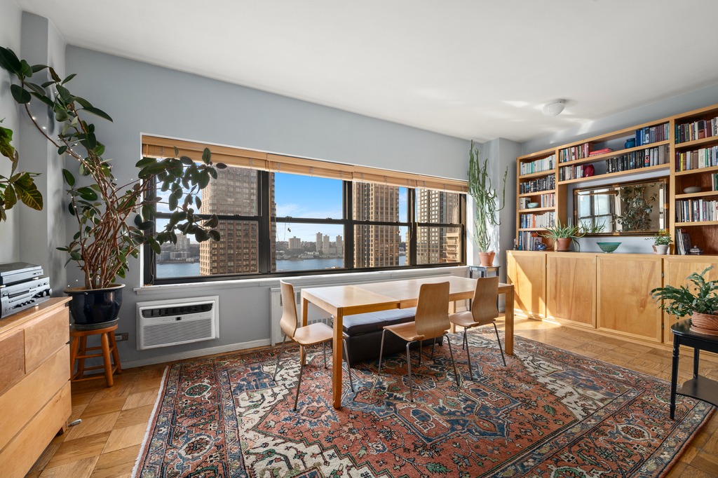 185 West End Avenue, Unit 29R Manhattan, NY 10023 - Photo 1 of 13 a living room with furniture and a window