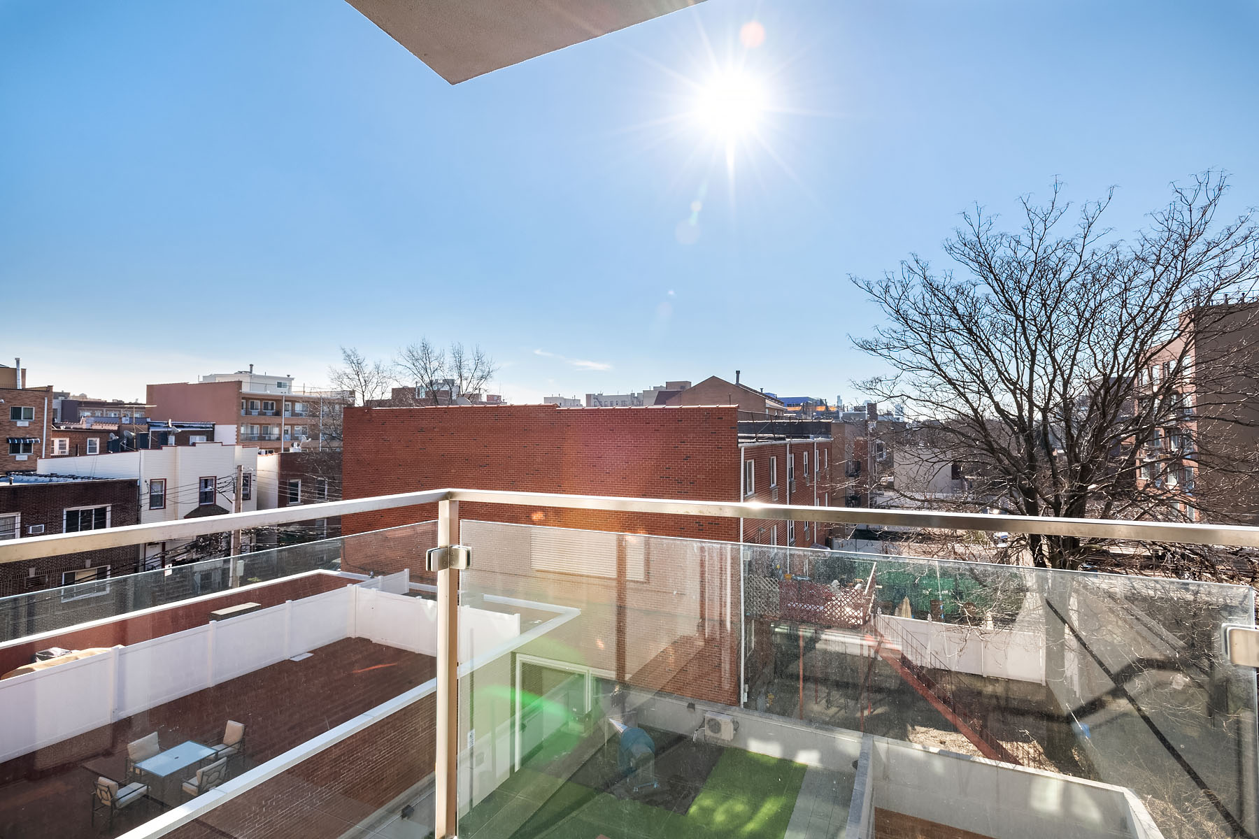 a view of a balcony with city view