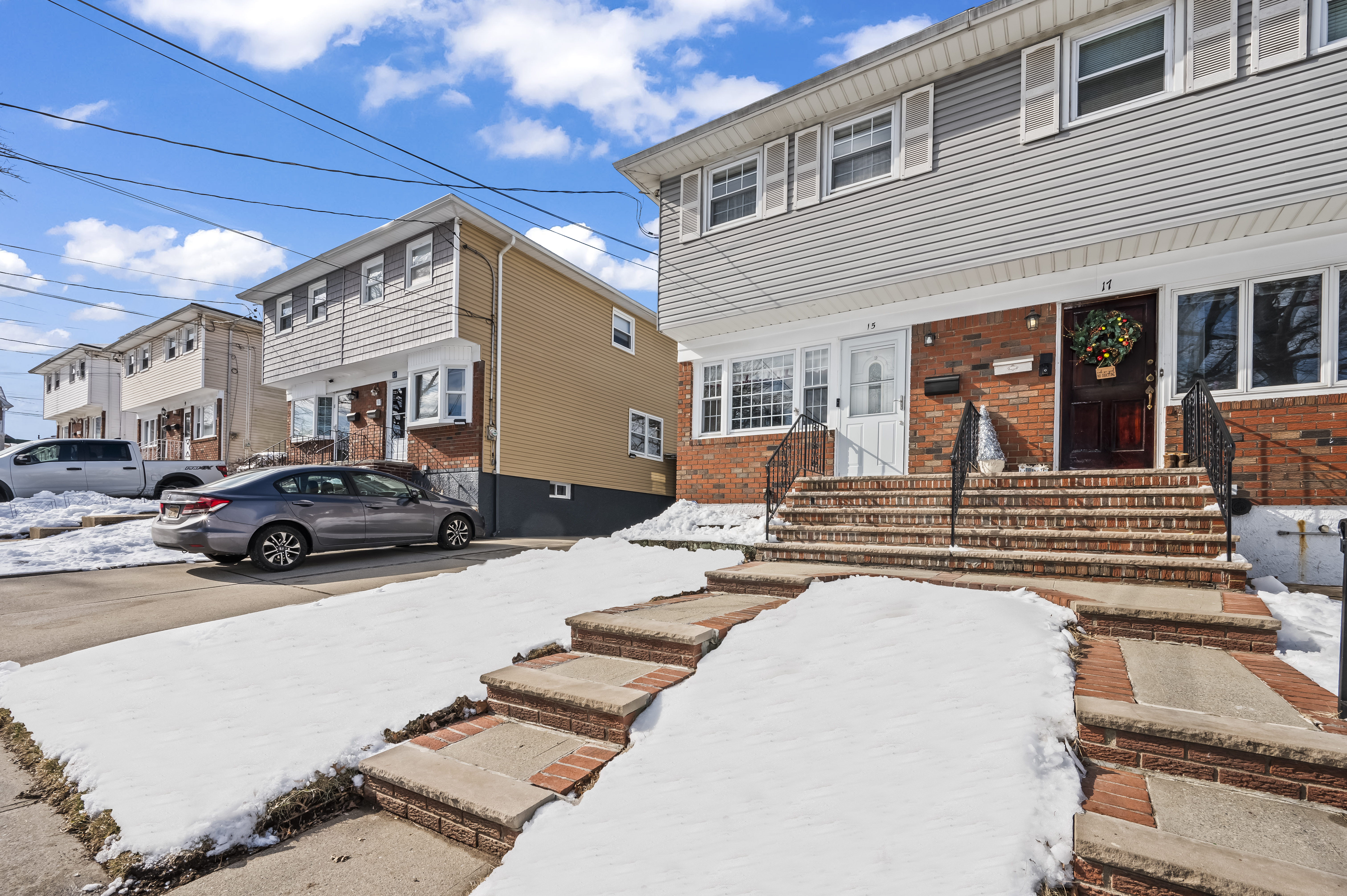 15 Area Place Staten Island, NY 10314 - Photo 3 of 27 a view of a car park in front of house