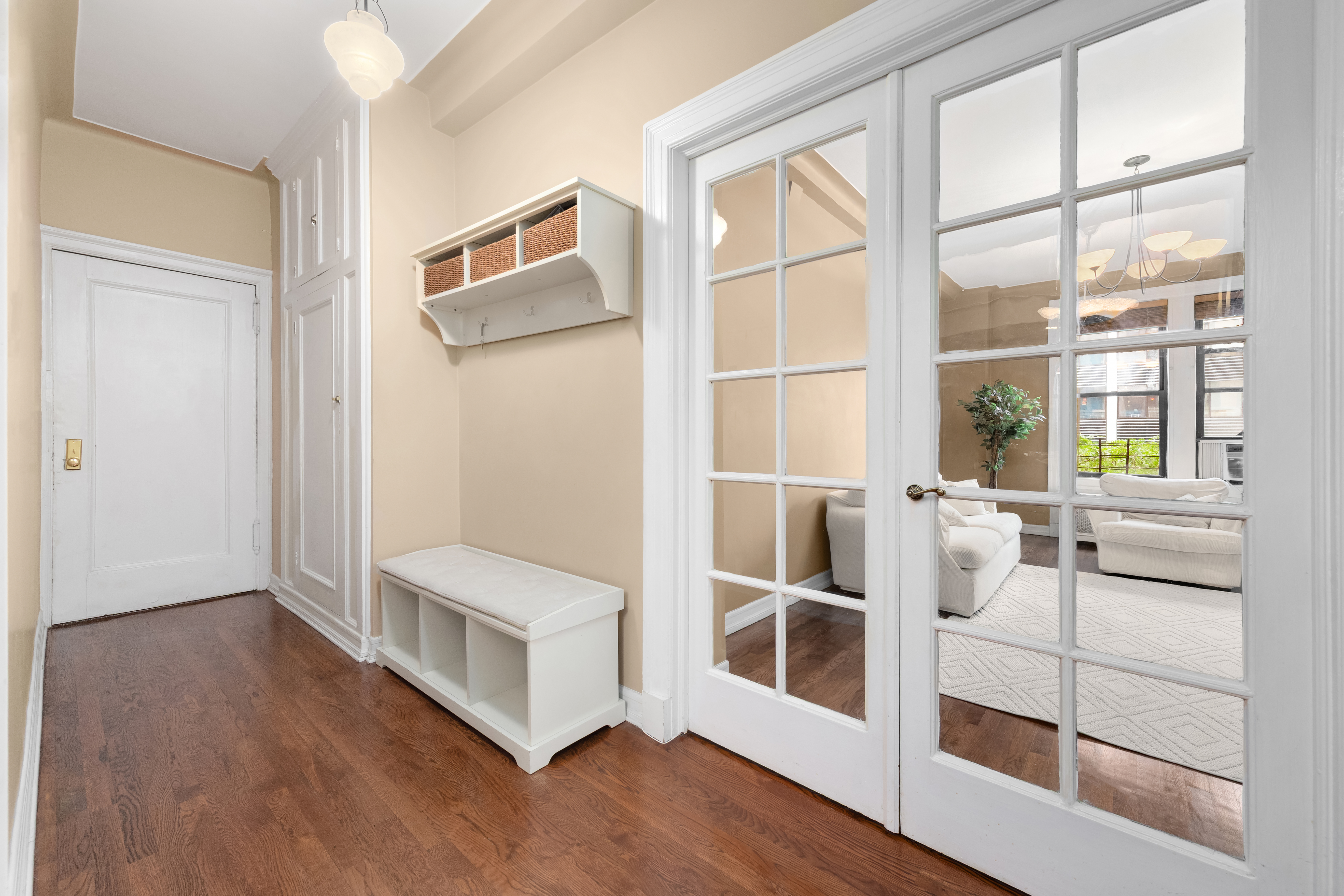 176 West 87th Street, Unit 3A Manhattan, NY 10024 - Photo 4 of 8 a view of an empty room with wooden floor and windows