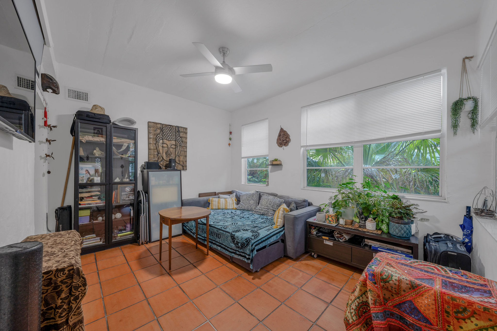 735-745 Meridian Avenue Miami Beach, FL 33139 - Photo 45 of 62 a living room with furniture and a large window