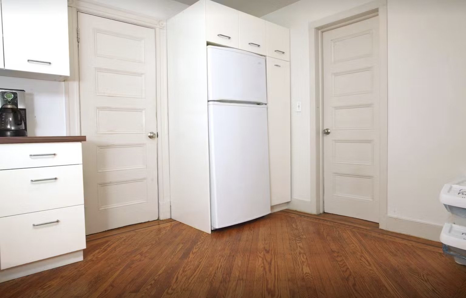 899 Lincoln Place, Unit 1 Brooklyn, NY 11213 - Photo 4 of 9 a view of walk in closet with wooden floor