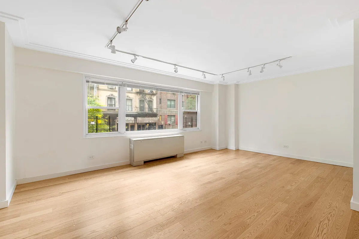333 East 66th Street, Unit 2FE Manhattan, NY 10065 - Photo 2 of 19 a view of an empty room with a window
