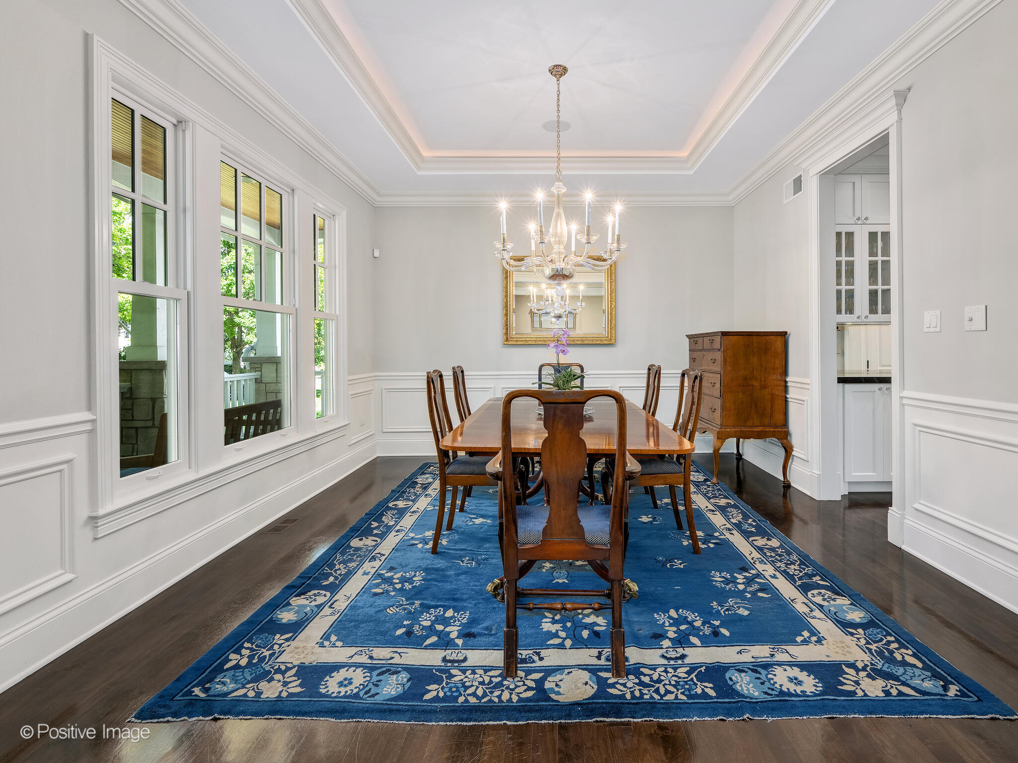 17 South Bruner Street Hinsdale, IL 60521 - Photo 11 of 42 a dining room with chandelier wooden floor and a rug