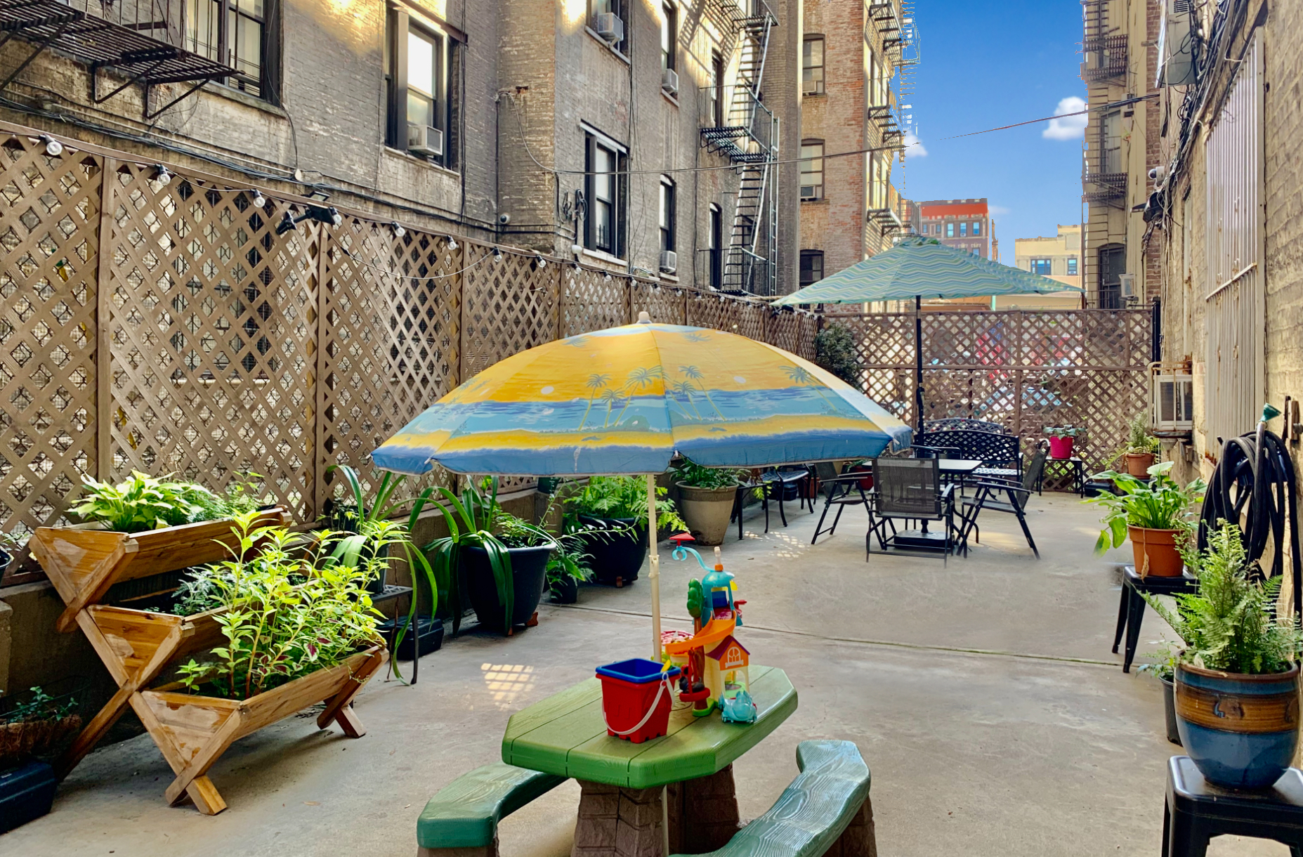 804 West 180th Street, Unit 41 Manhattan, NY 10033 - Photo 20 of 23 an outdoor space with patio furniture and potted plants