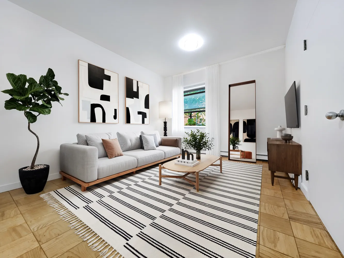 a living room with furniture and a rug