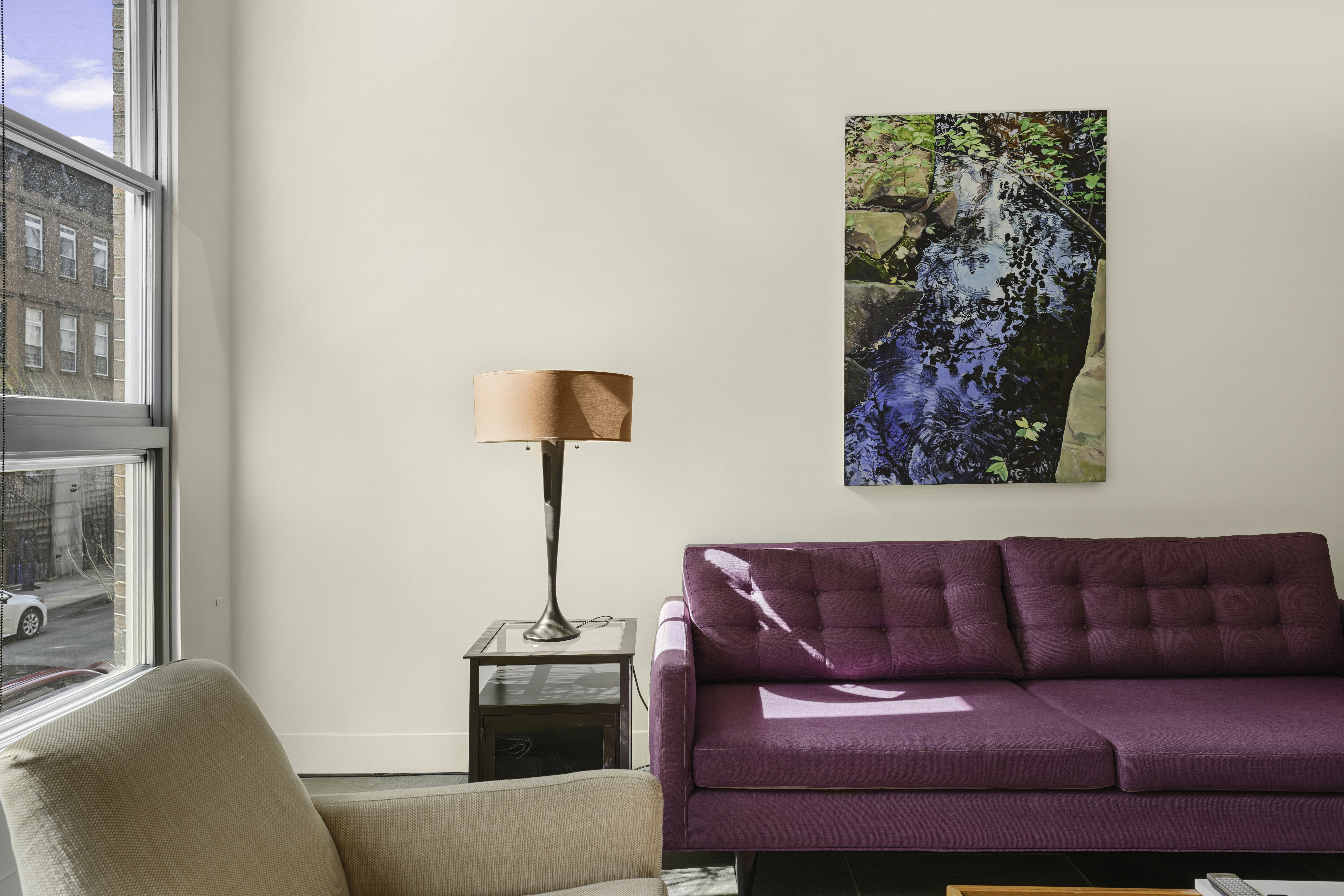 133 West 123rd Street Manhattan, NY 10027 - Photo 7 of 31 a living room with furniture and a lamp