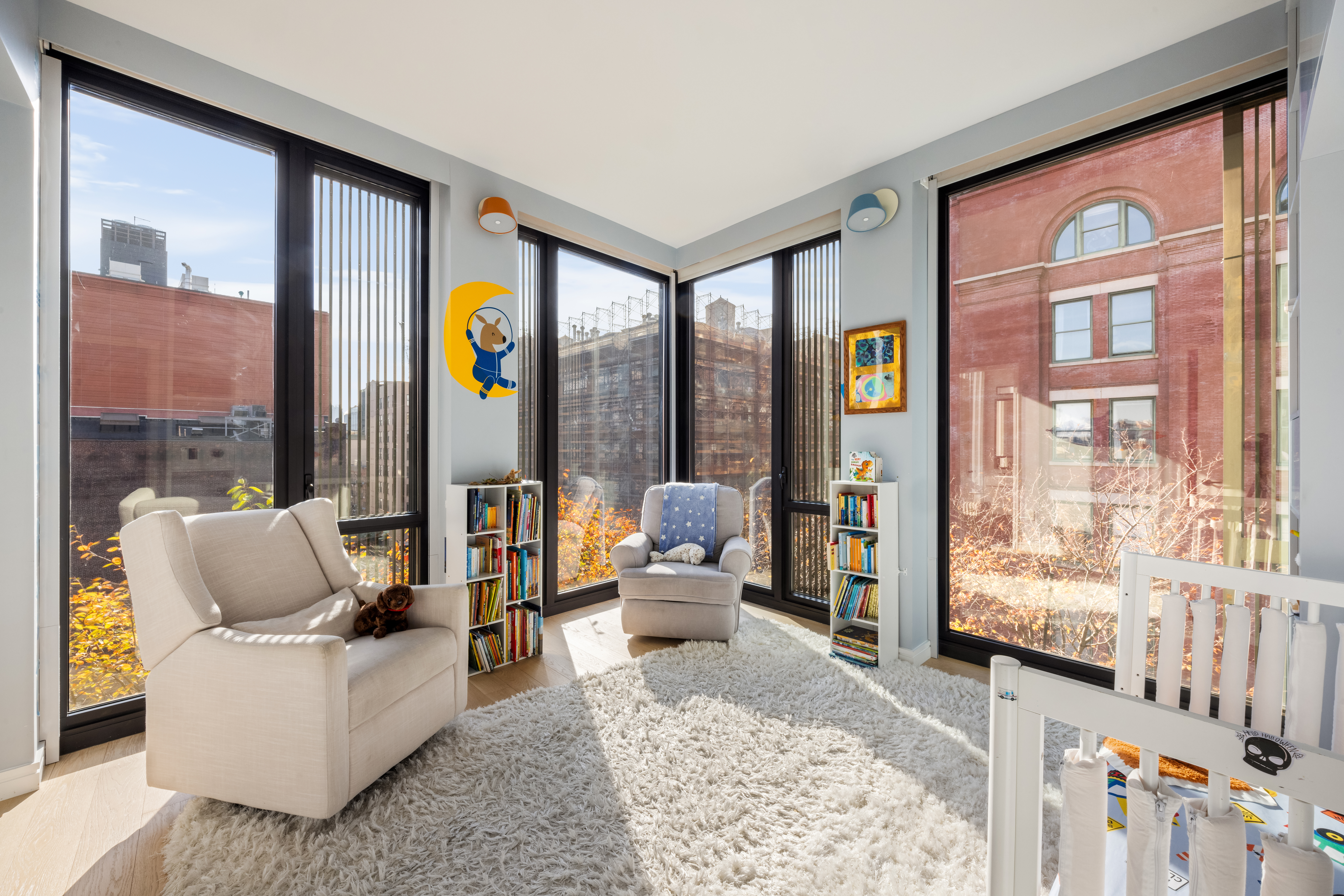 100 Barrow Street, Unit 7/8A Manhattan, NY 10014 - Photo 16 of 23 a living room with furniture and a floor to ceiling window