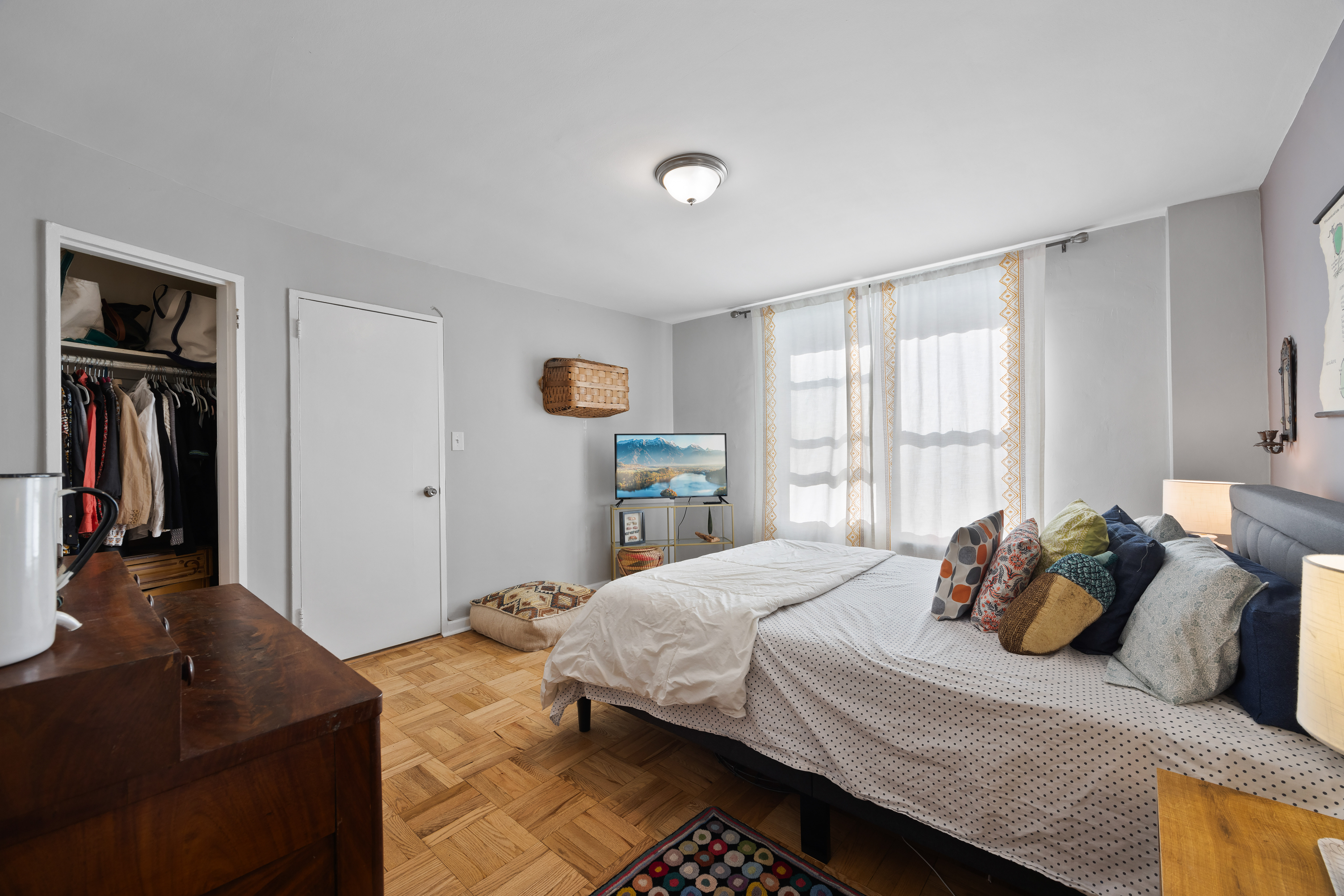255 Fieldston Terrace, Unit 2L Bronx, NY 10471 - Photo 20 of 32 a bedroom with a bed and a window