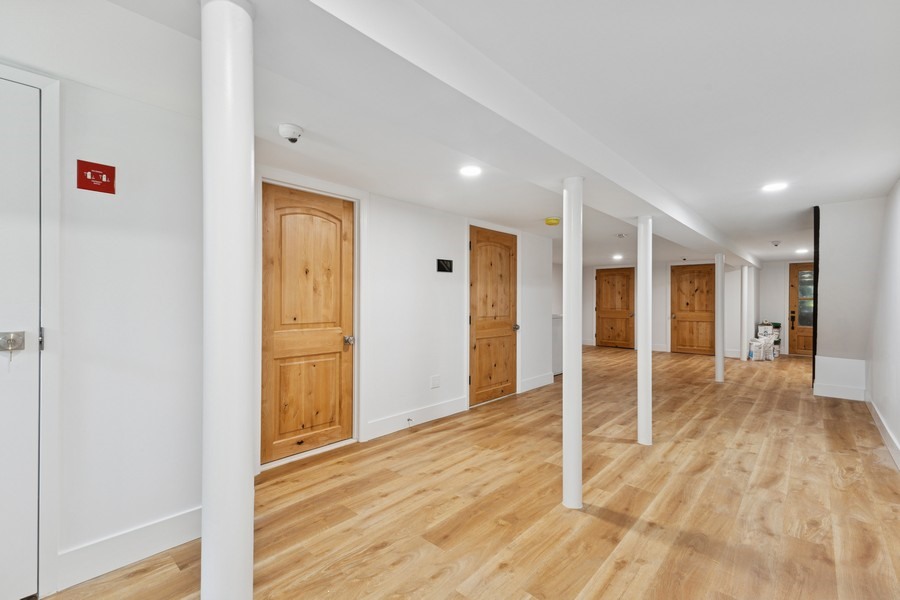 144 Somers Street, Unit 2 Brooklyn, NY 11233 - Photo 7 of 10 a view of livingroom with wooden floor