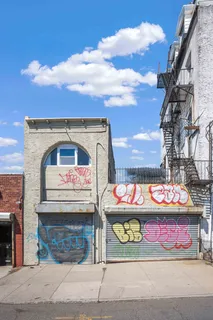 a view of a building with a street