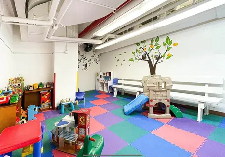 a living room filled with furniture and a table