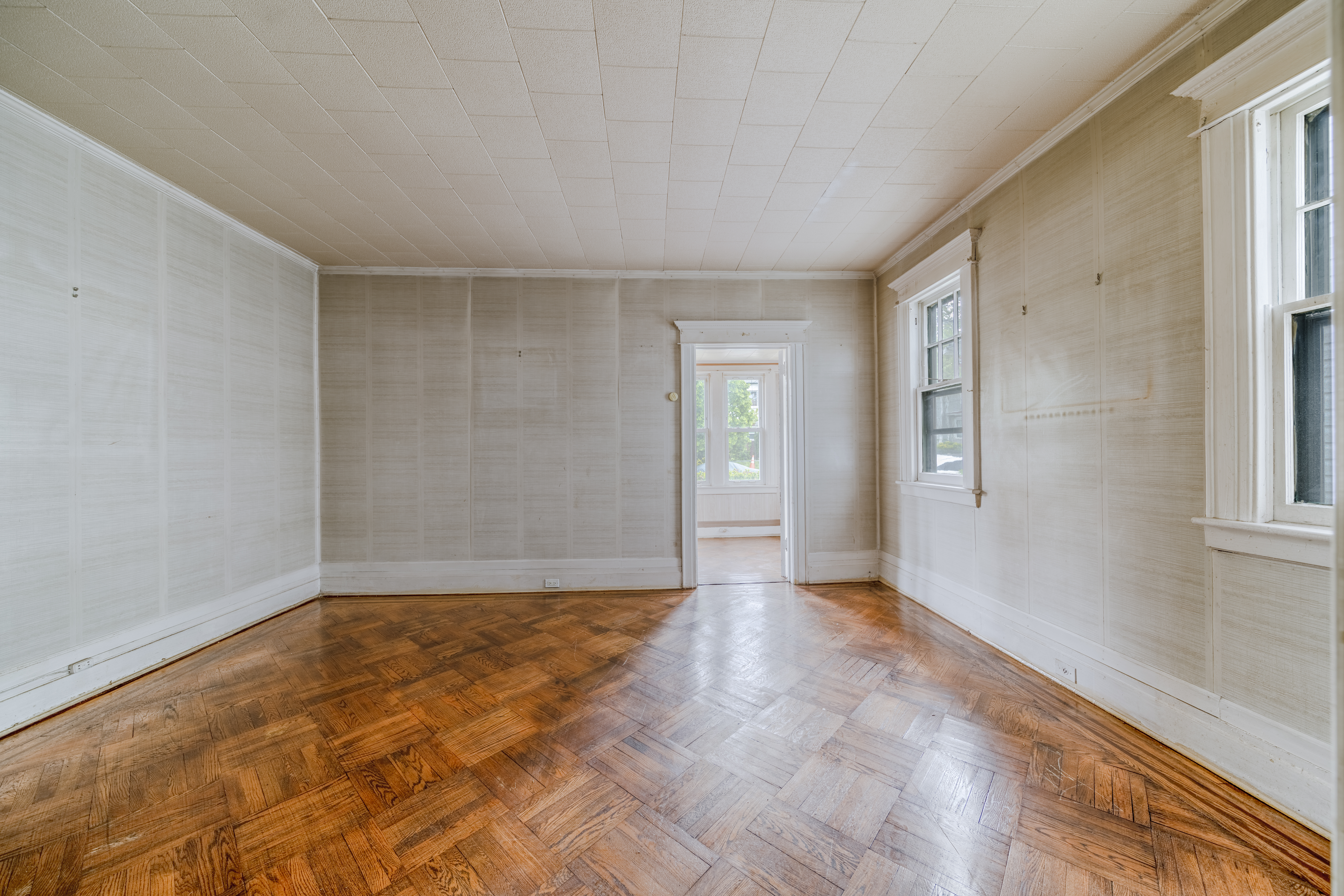 100-30 198th Street Queens, NY 11423 - Photo 6 of 15 a view of an empty room and window