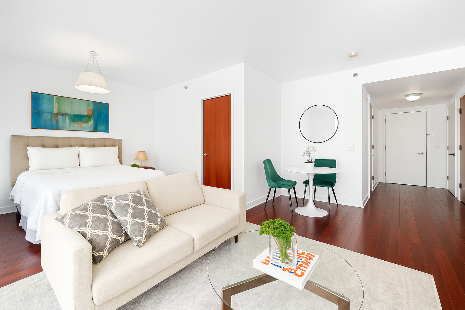 125 West 21st Street, Unit 4C Manhattan, NY 10011 - Photo 5 of 12 a living room with furniture and a table