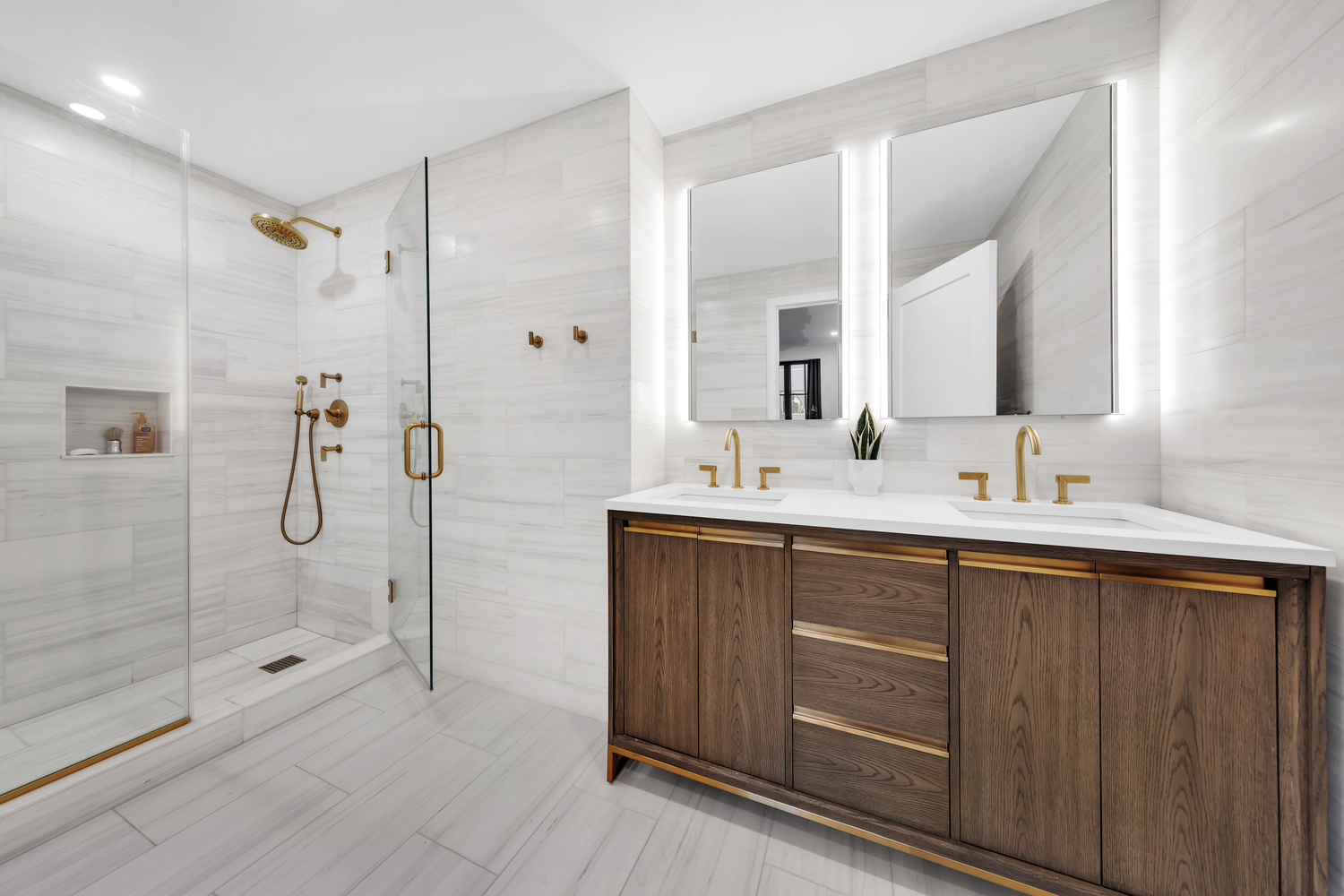 532 Clinton Avenue, Unit 5A Brooklyn, NY 11238 - Photo 8 of 11 a bathroom with a shower sink and mirror