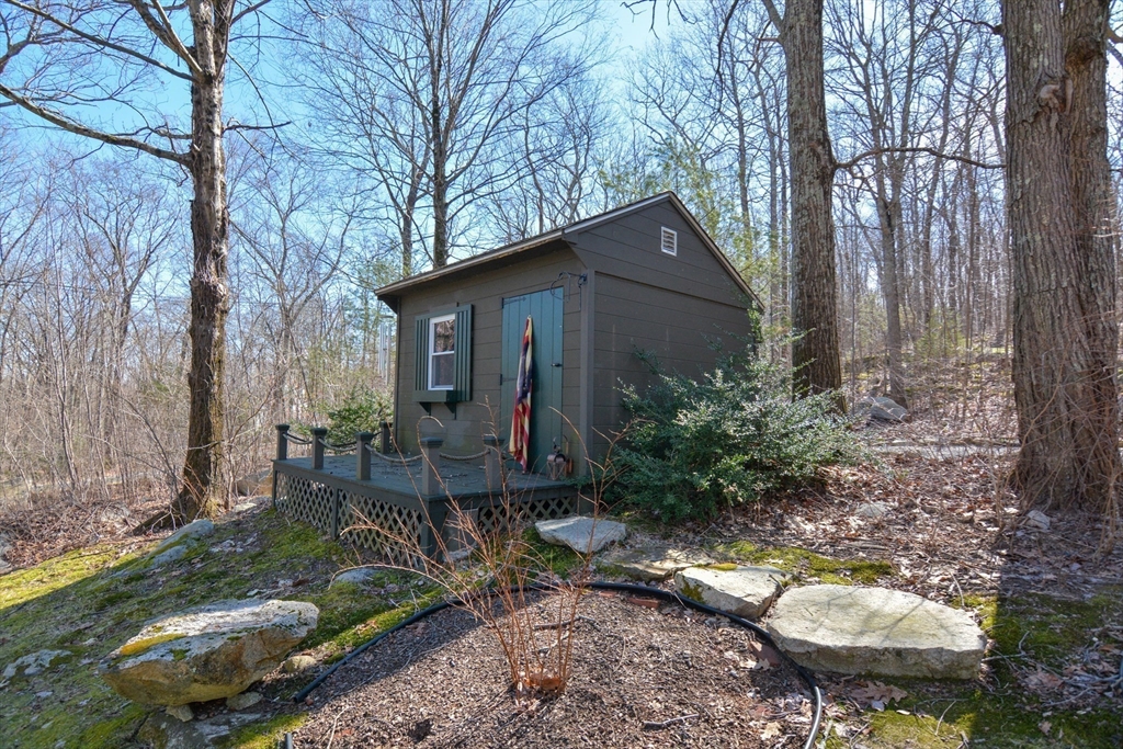 187 Blackstone Street Mendon, MA 01756 - Photo 42 of 42 a backyard of a house with yard and outdoor seating