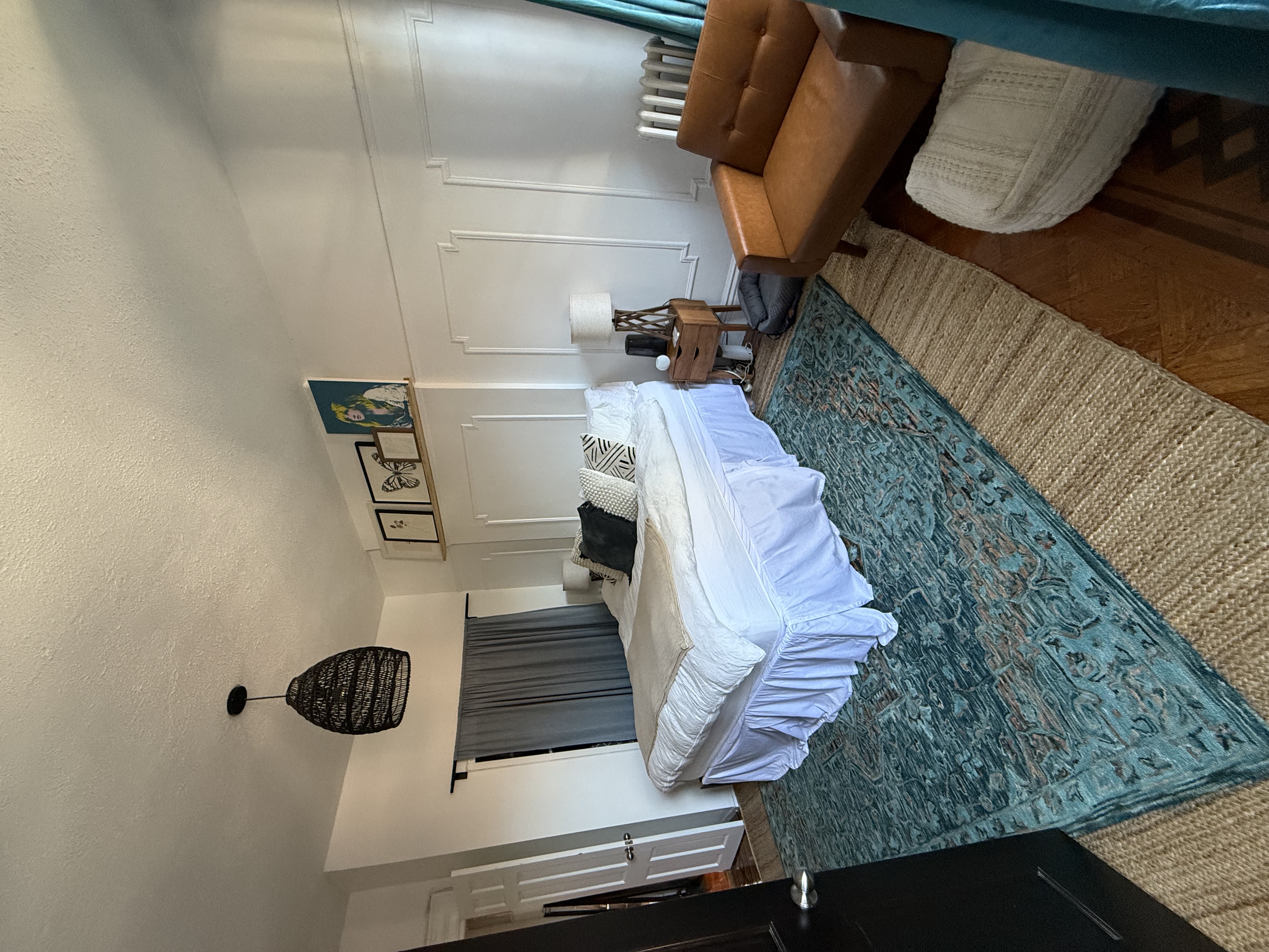 230 17th Street, Unit 2 Brooklyn, NY 11215 - Photo 13 of 16 a bedroom with bed and a couch