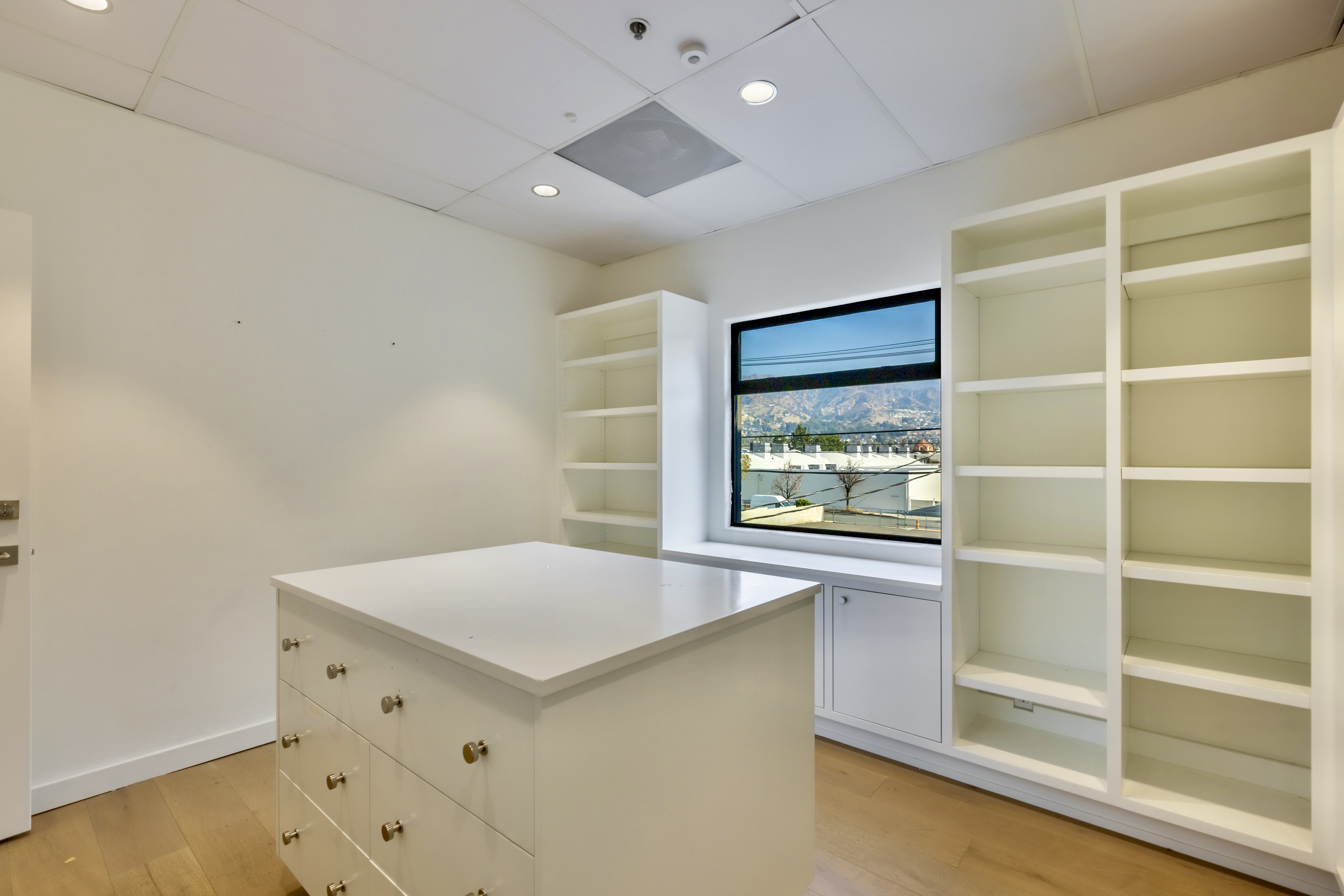 3058 North Lima Street Burbank, CA 91504 - Photo 35 of 41 a room with window and a ceiling fan